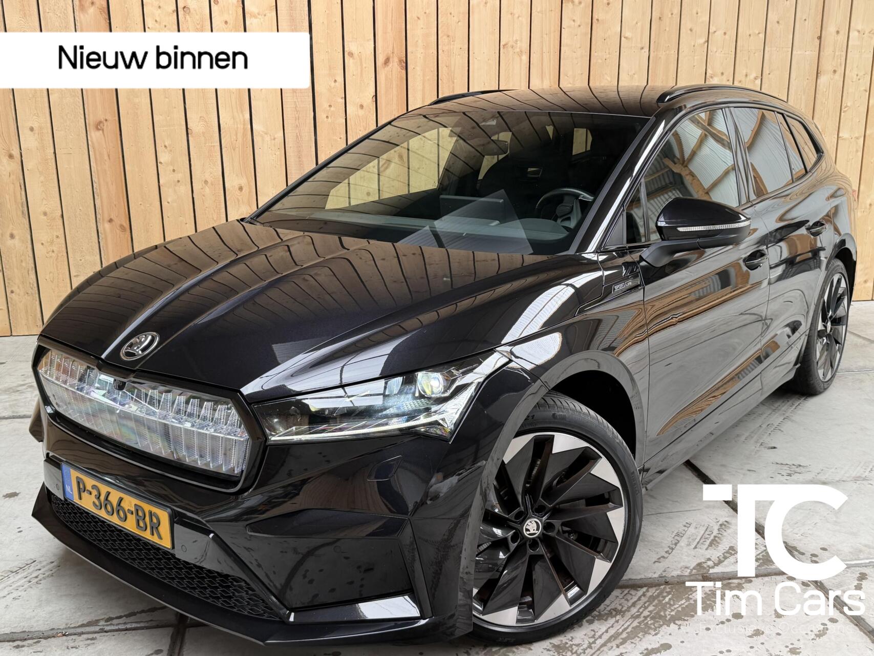 Skoda Enyaq 80 80 Sportline 95,97% Crystal Face | Apple CarPlay/Android Auto | Adaptieve cruise control | Climate control | 21 inch lichtmetalen velgen | LED koplampen | Navigatiesysteem | Rondomzicht camera |  Stuurverwarming 2022 - voorkant