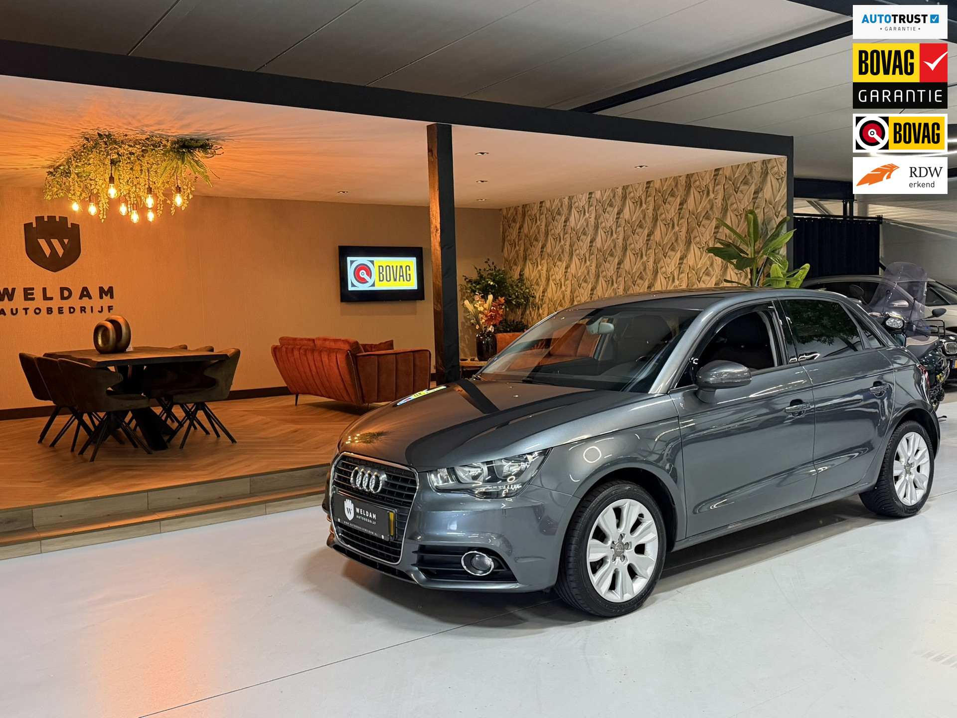 Audi A1 Sportback 1.2 TFSI Ambition Pro Line Clima Stoelverwarming Apk 5 Deurs Rijklaar 2012 - voorkant