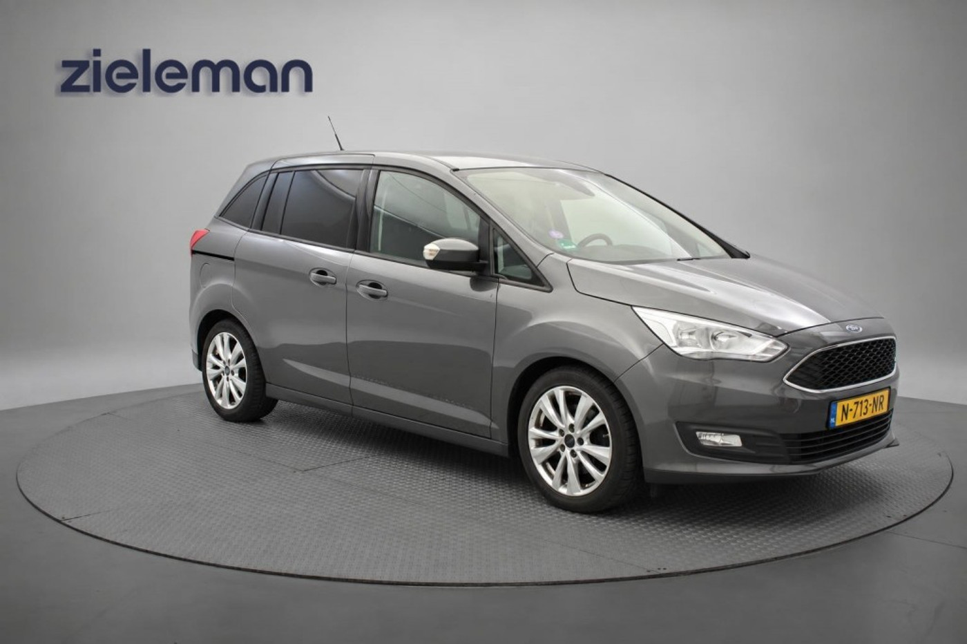 Ford Grand C-max 1.0 Ambiente 7 Persoons - Navi, Cruise, Clima, Stoelverw. Trekhaak 2015 - voorkant