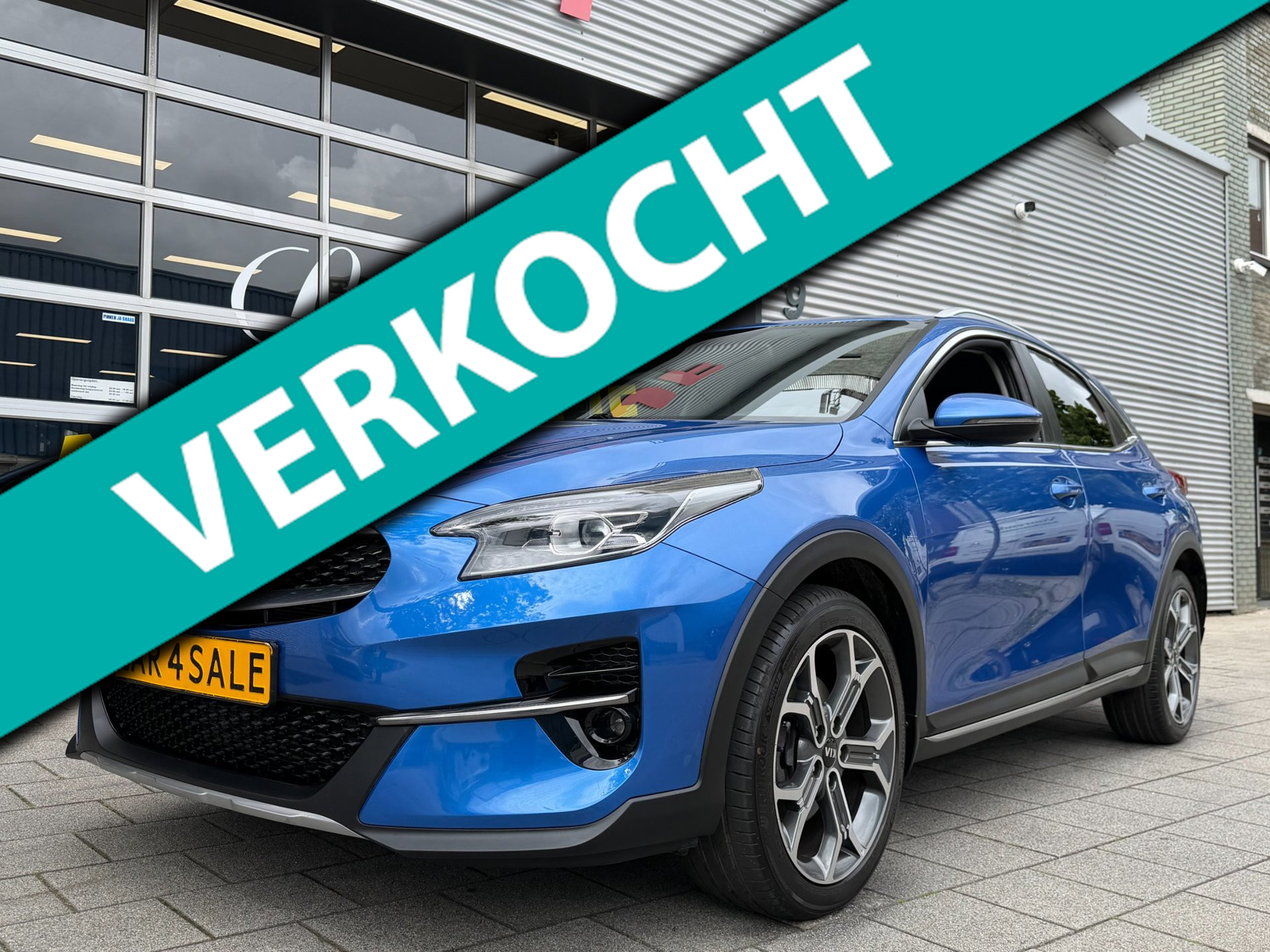 Kia Xceed 1.4 T-GDi DynamicPlusLine - Navigatie I Camera & PDC I LED I Sport pakket 1/2 Leer I 89.000 KM - Dealer onderhouden 2020 - voorkant
