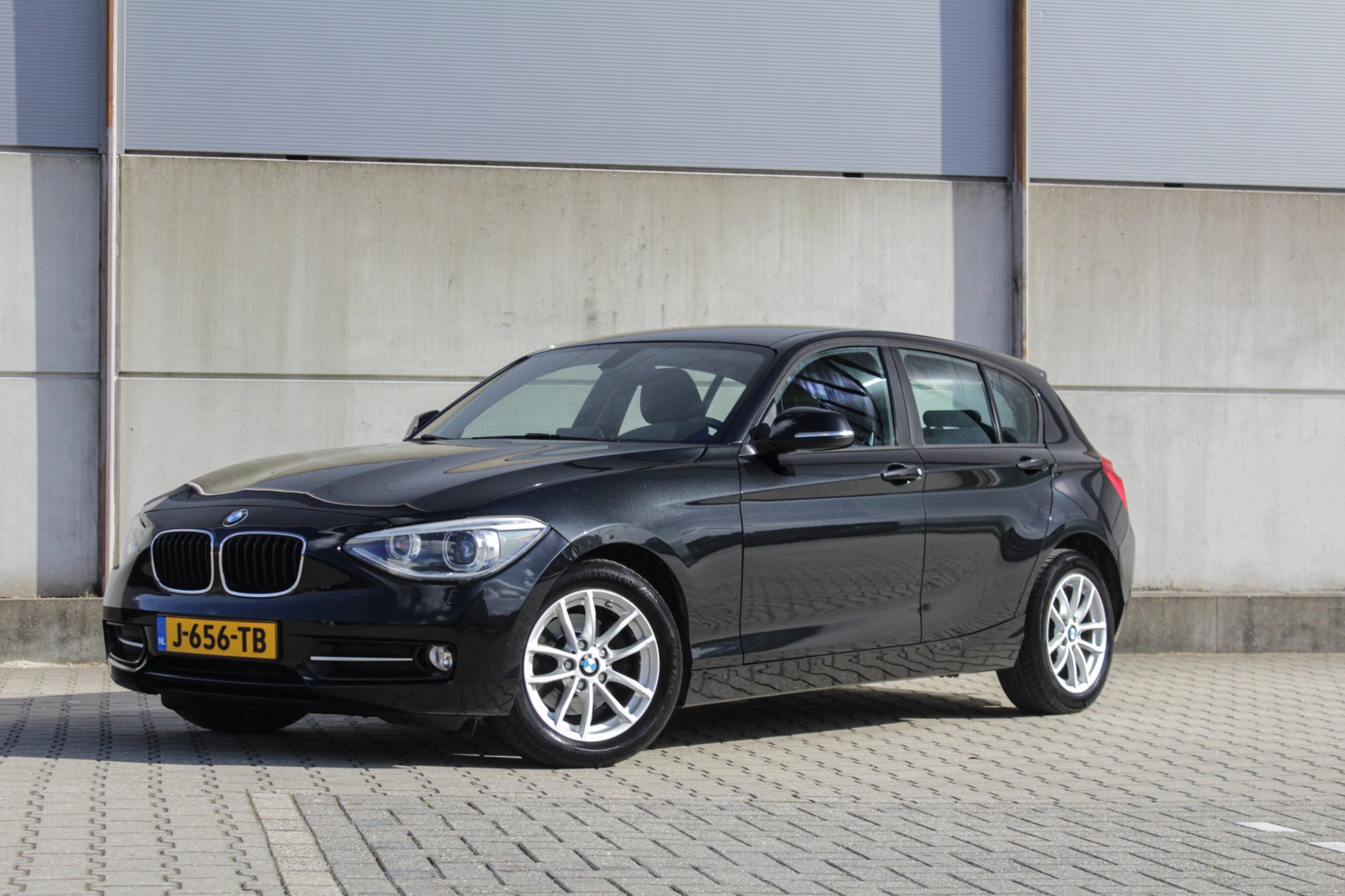 BMW 118i 118i High Executive - automaat - stoelverwarming 2014 - voorkant