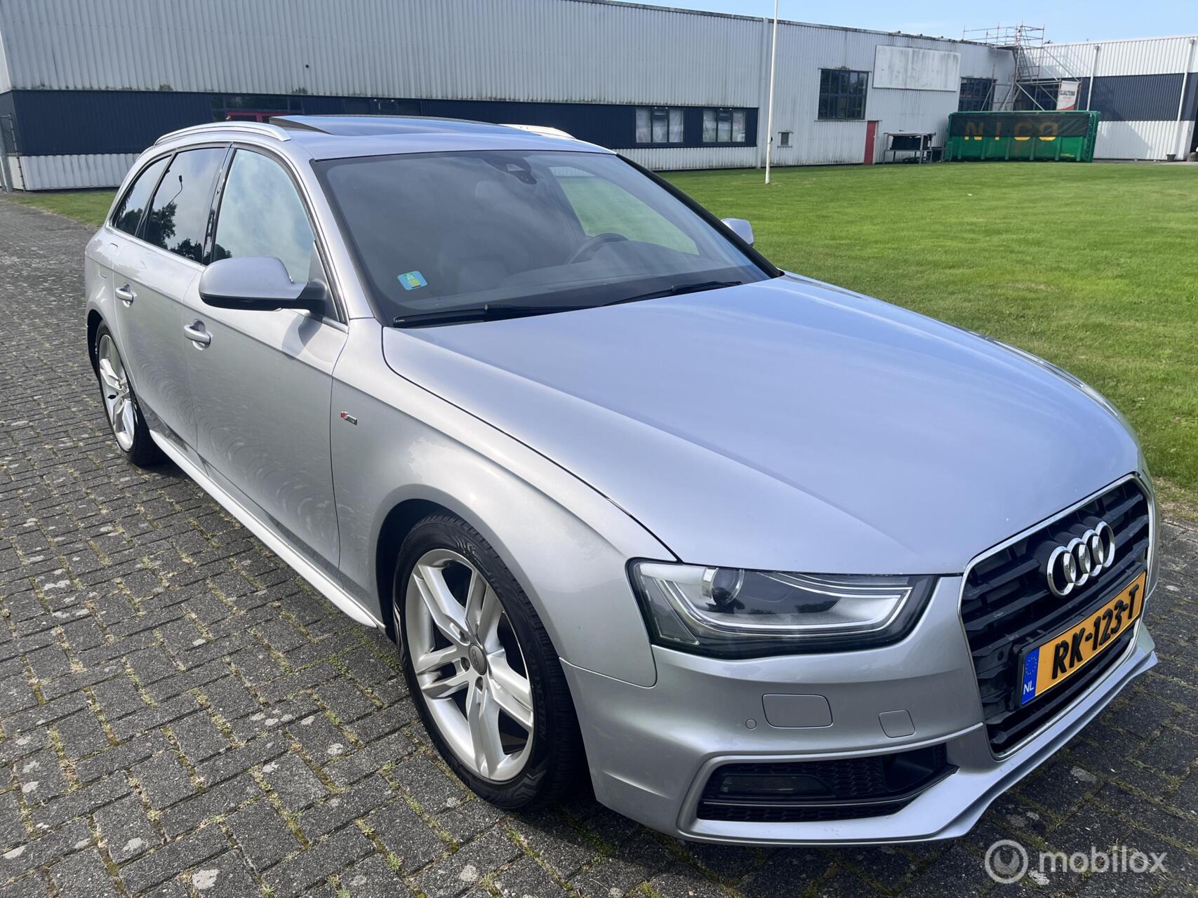 Audi A4 Avant 2.0 TDI Pro Line 3xS Automaat / Panorama / Navi / Cruise / Leer / Trekhaak / PDC / B&O / 2014 - voorkant