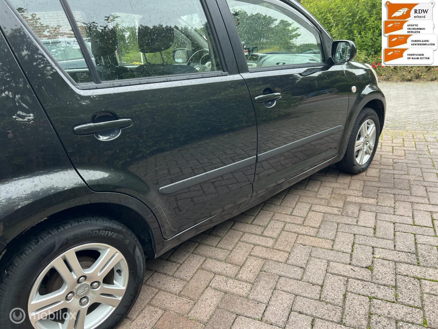 Foto van Subaru Justy
