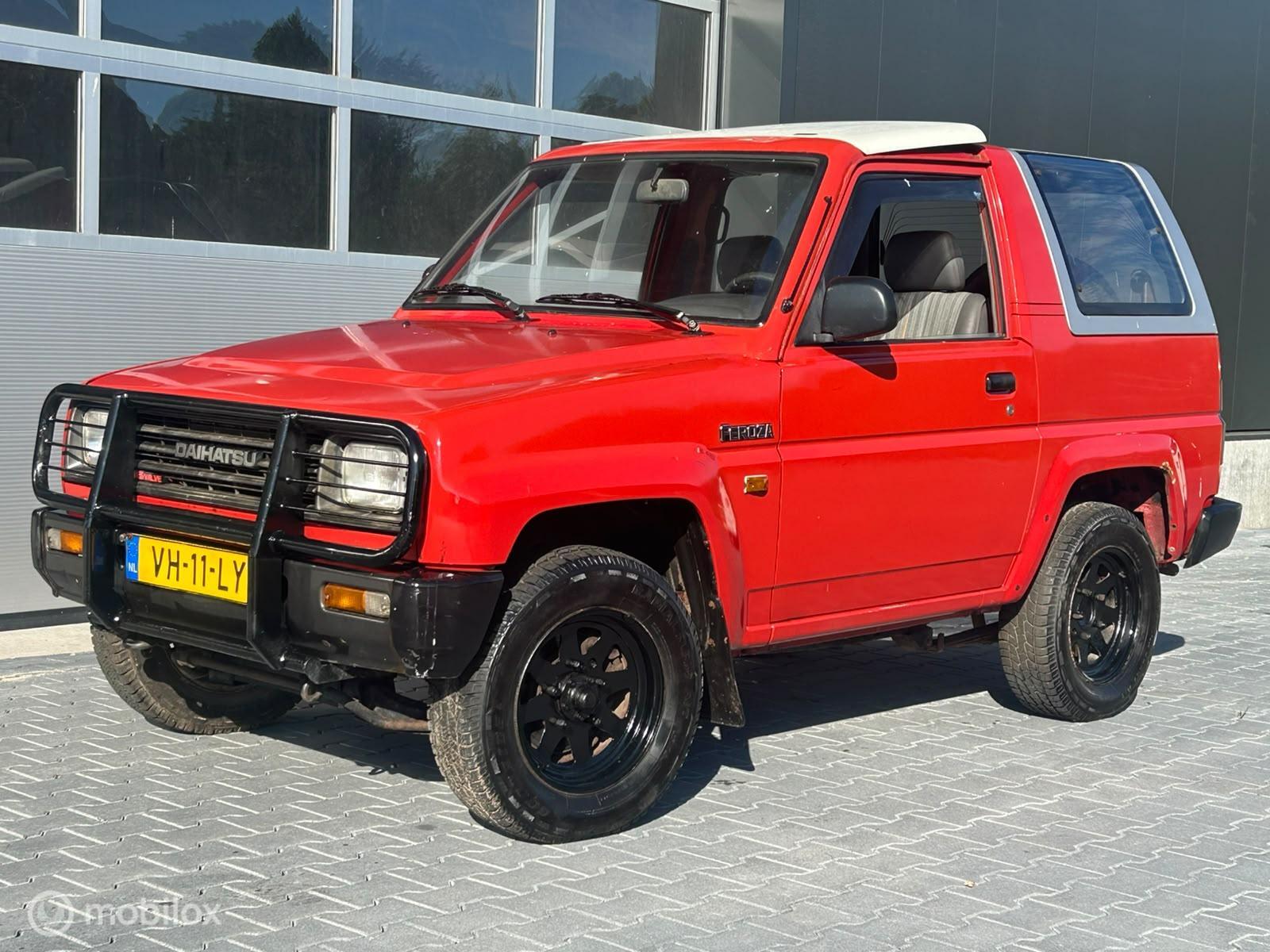 Daihatsu Feroza Cabrio-top Inj. DX 1.6 ResinTop, NAP, weinig roest 1990 - voorkant