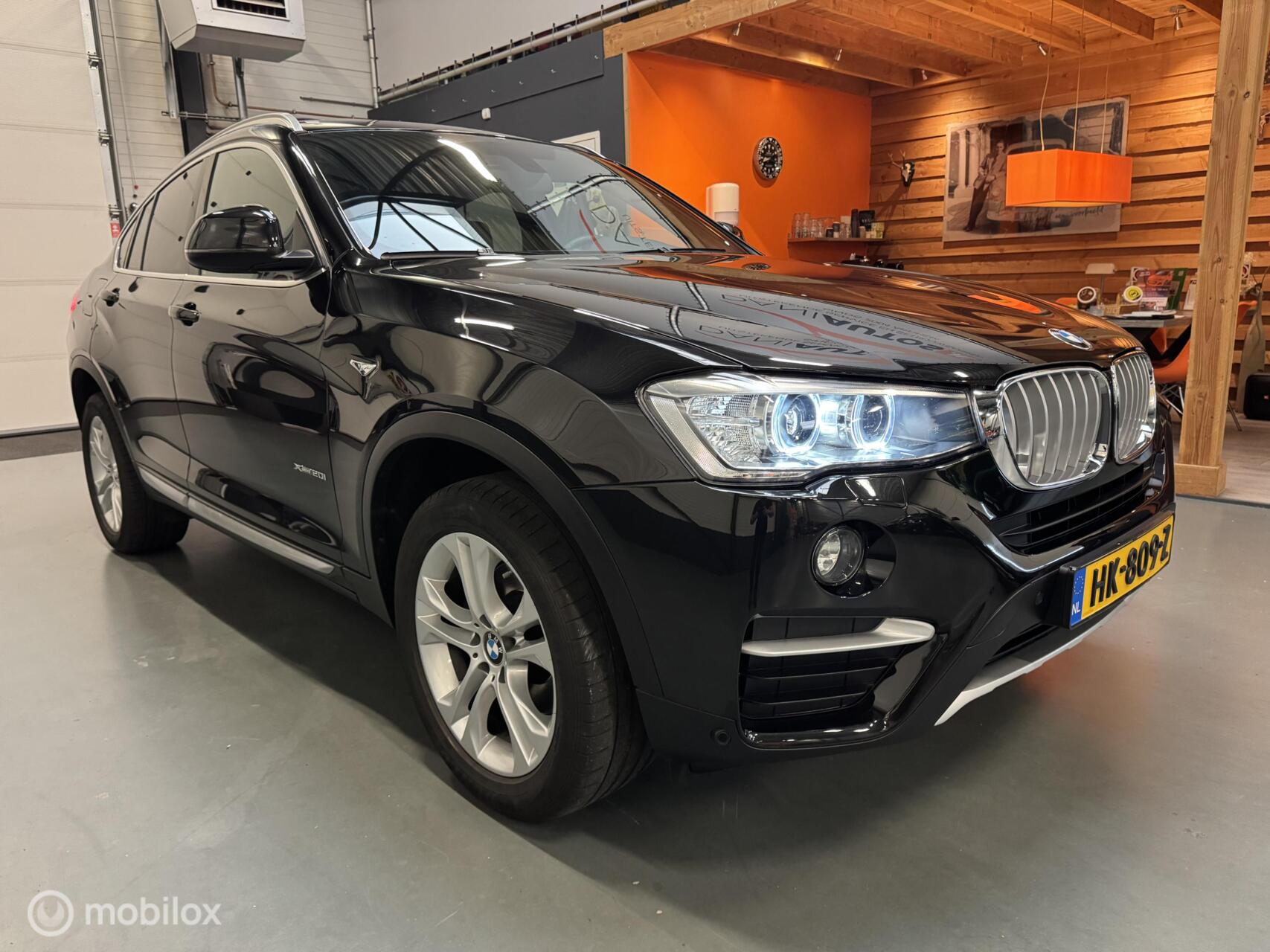 Foto van BMW X4 Xdrive20i