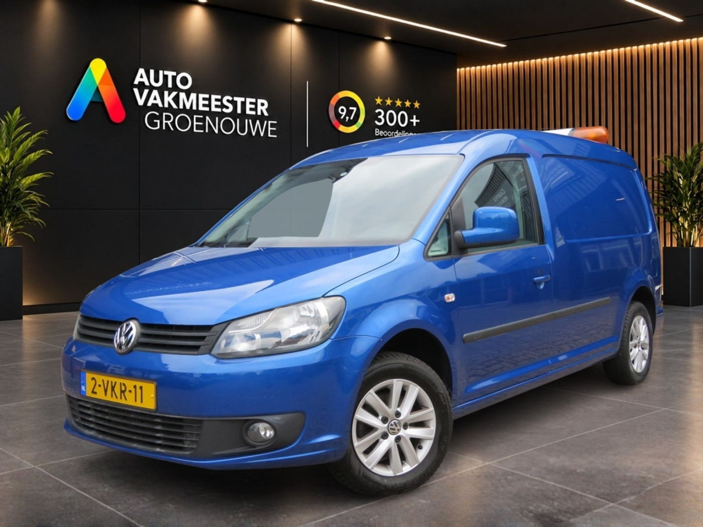 Volkswagen Caddy 1.6 TDI 102pk DSG-aut. MAXI First Edition / Navi / Trekhaak / Pdc / Sportvelgen 2011 - voorkant