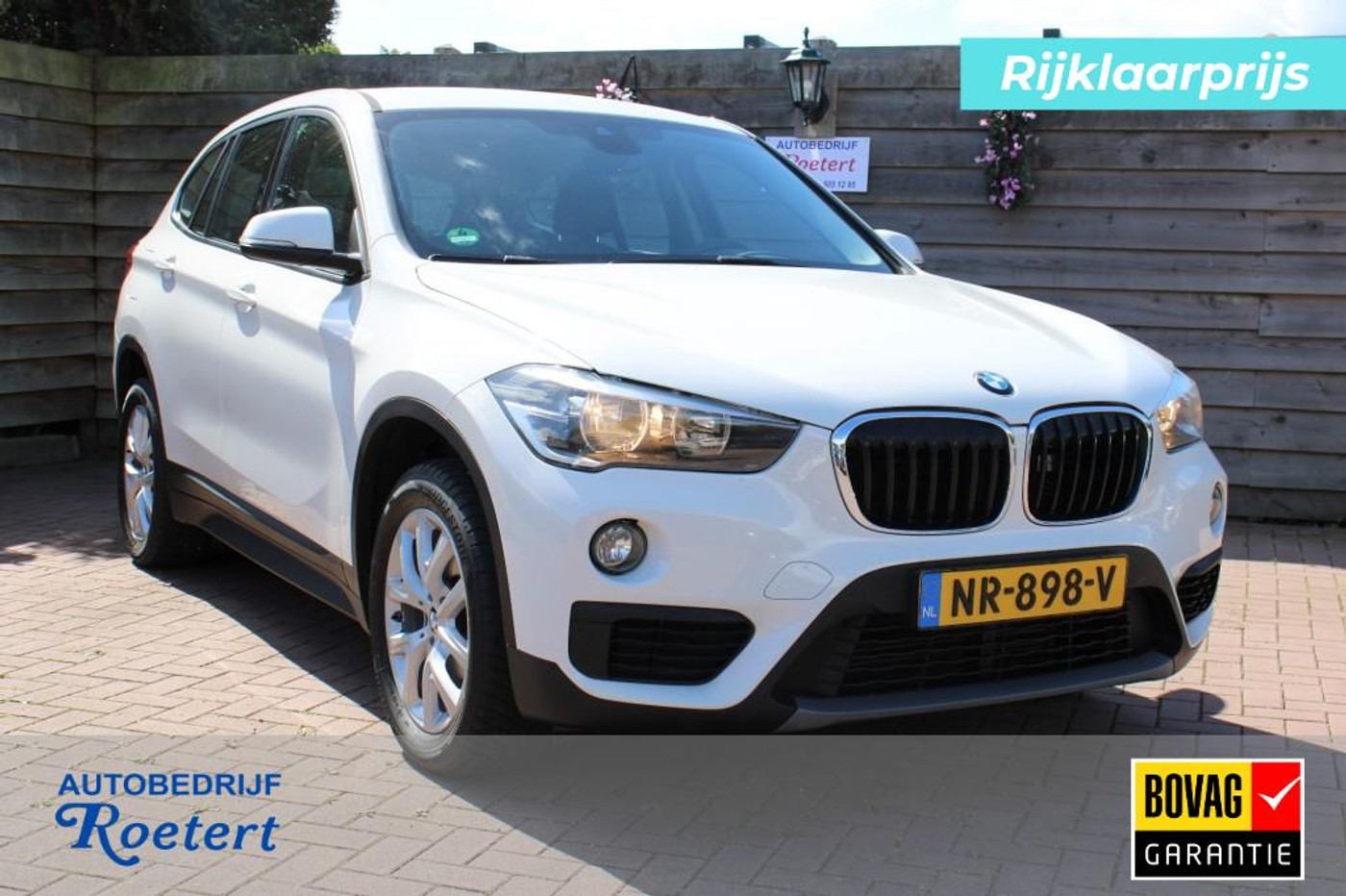 BMW X1 sDrive 18i sDrive18i 136pk Essential ECC/Cruise/Navi/PDC/Stoelverw/Trekhaak 2016 - voorkant