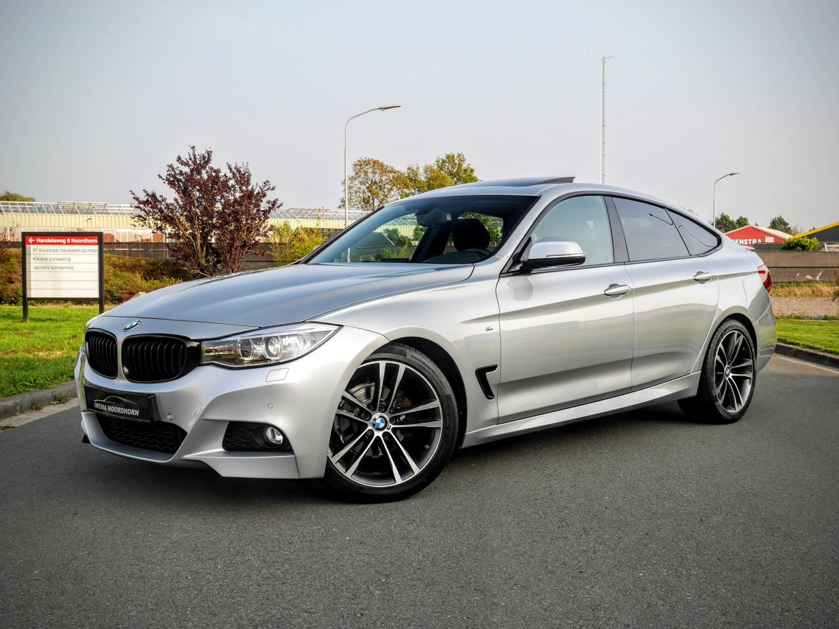 BMW 3-serie Gran Turismo 318d M Pakket Edition High Executive 2014 - voorkant