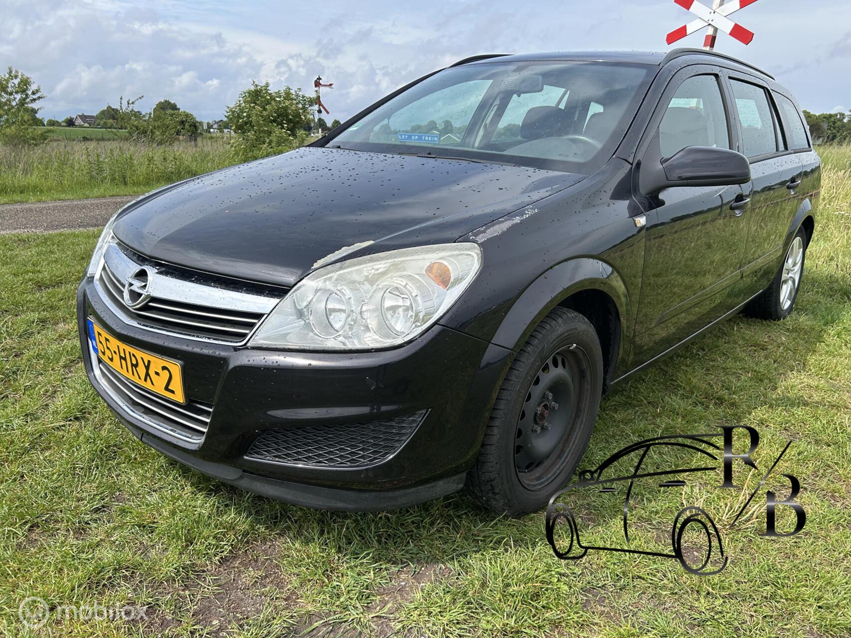 Opel Astra Wagon 1.6 Business INRUILKOOPJE NAVI AIRCO CRUISE 2009 - voorkant