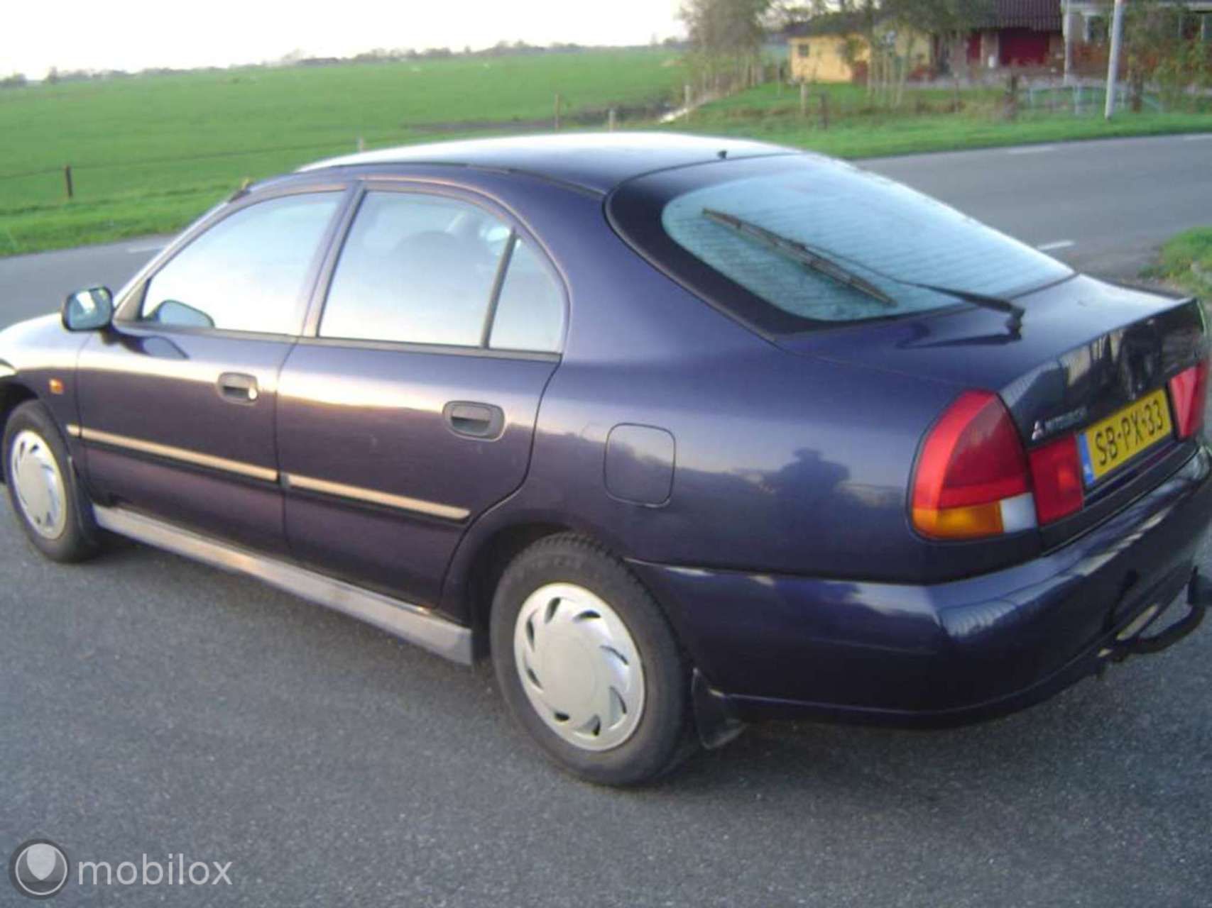 Foto van Mitsubishi Carisma