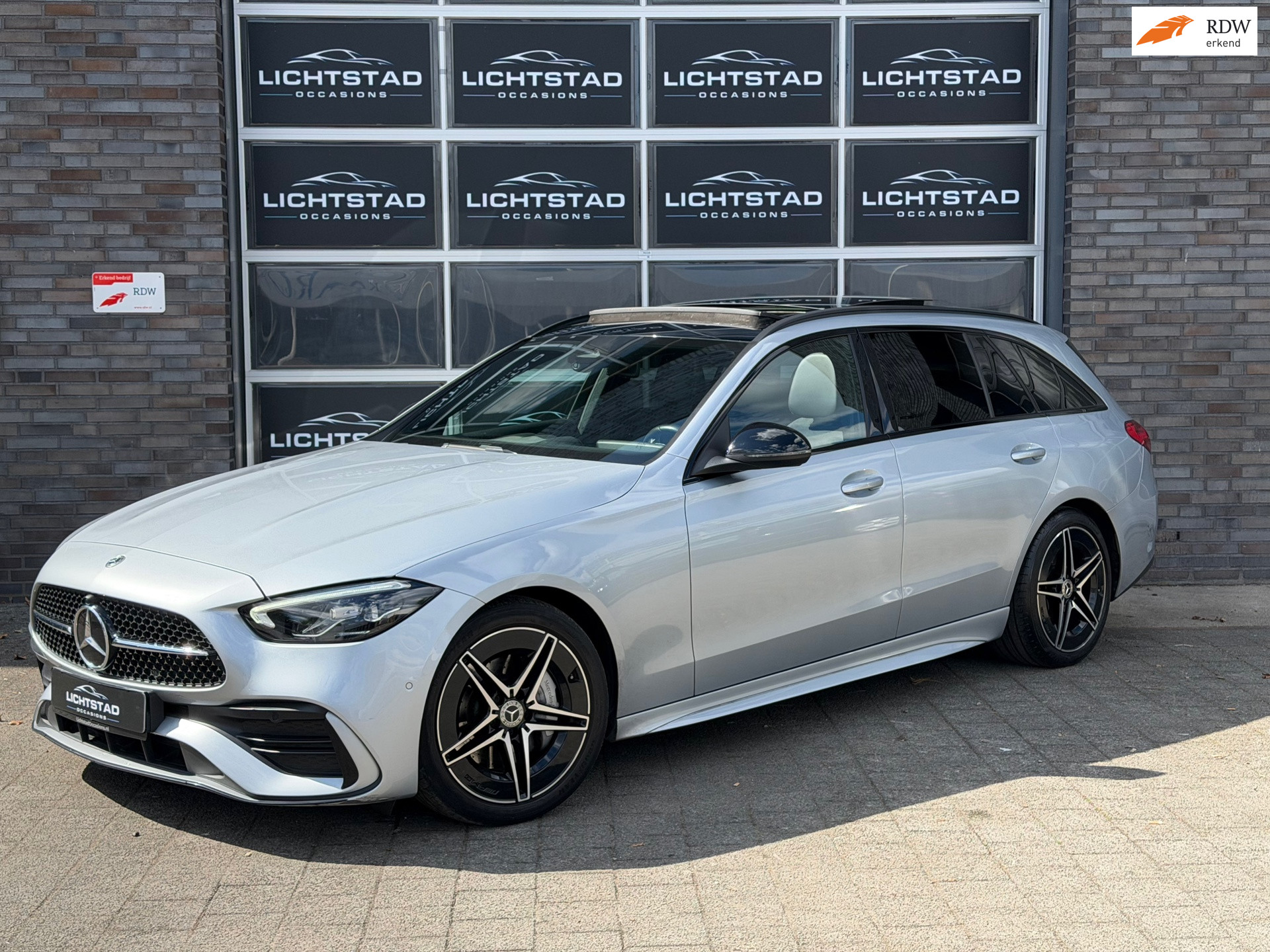 Mercedes-Benz C 200 200 AMG Line PANO CRUISE  SFEERVERLICHTING 100% ONDERHOUD 2021 - voorkant
