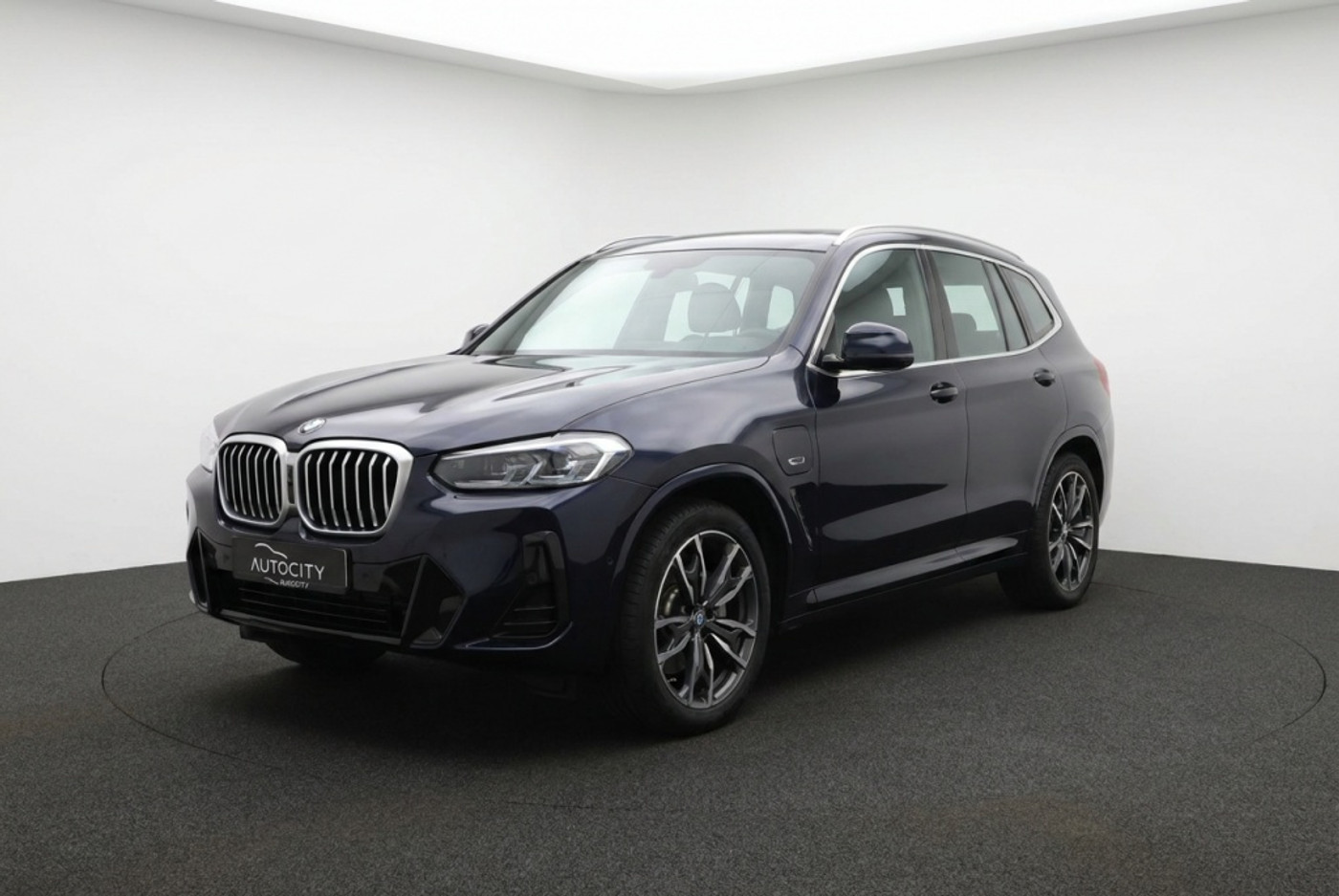 BMW X3 Xdrive30e Bmw X3 xDrive30e High Executive M Sport Pano | Laser | Leder | 360° | HUD | Innovation Pack 2021 - voorkant