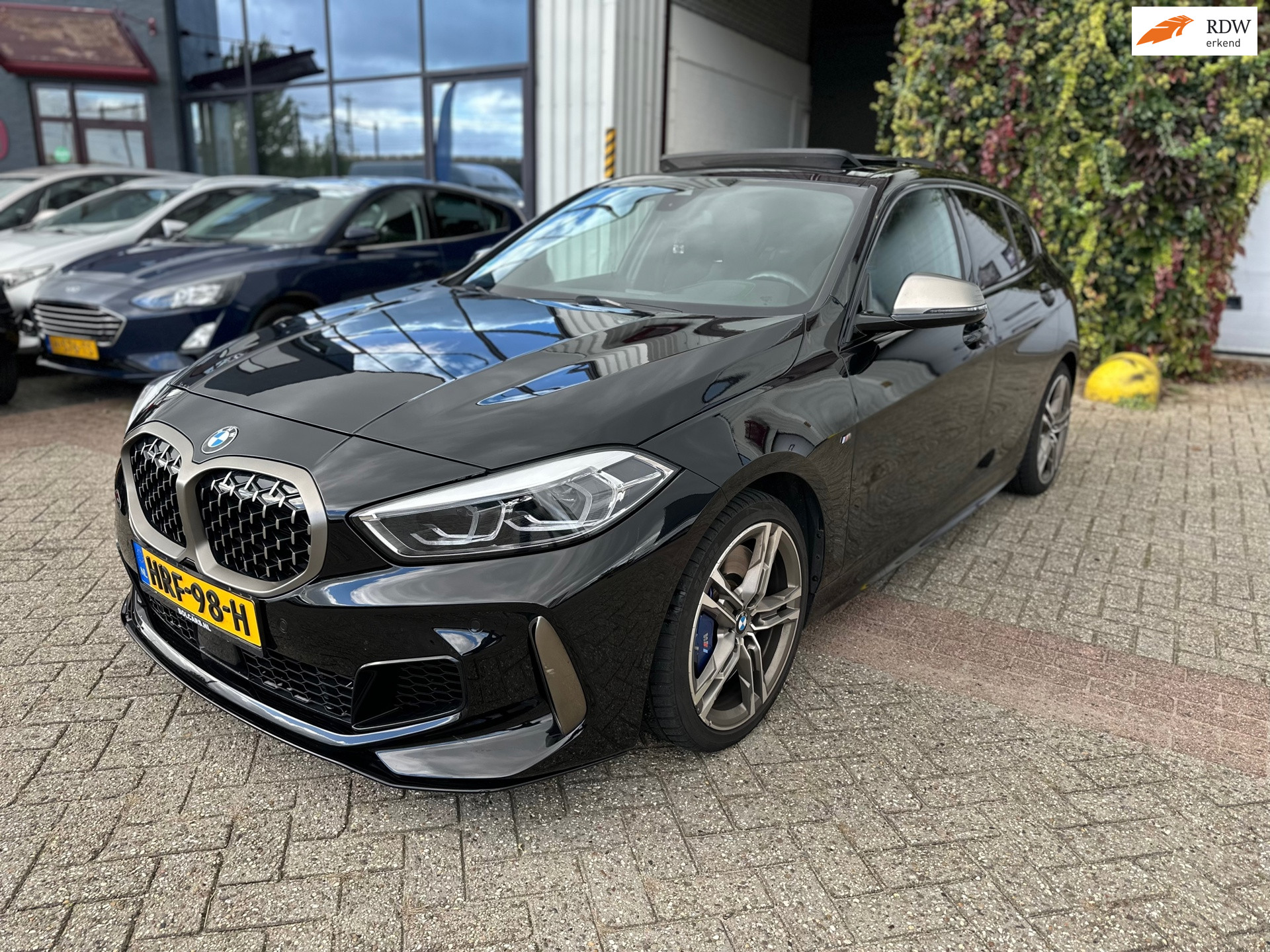 BMW M135i xDrive M135i xDrive High Executive,PANO,HUD,Camera 2019 - voorkant