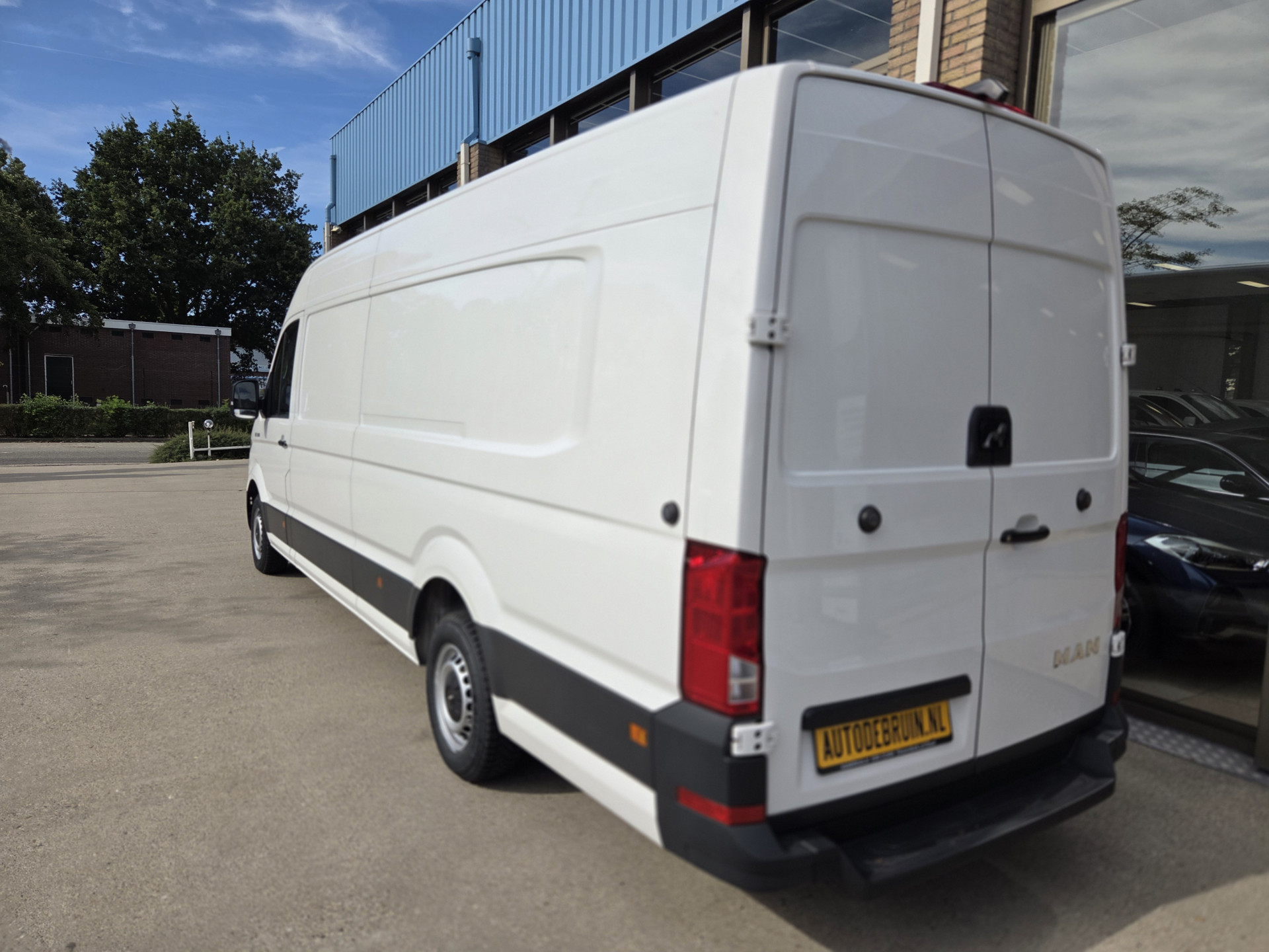 Foto van Man Tge
