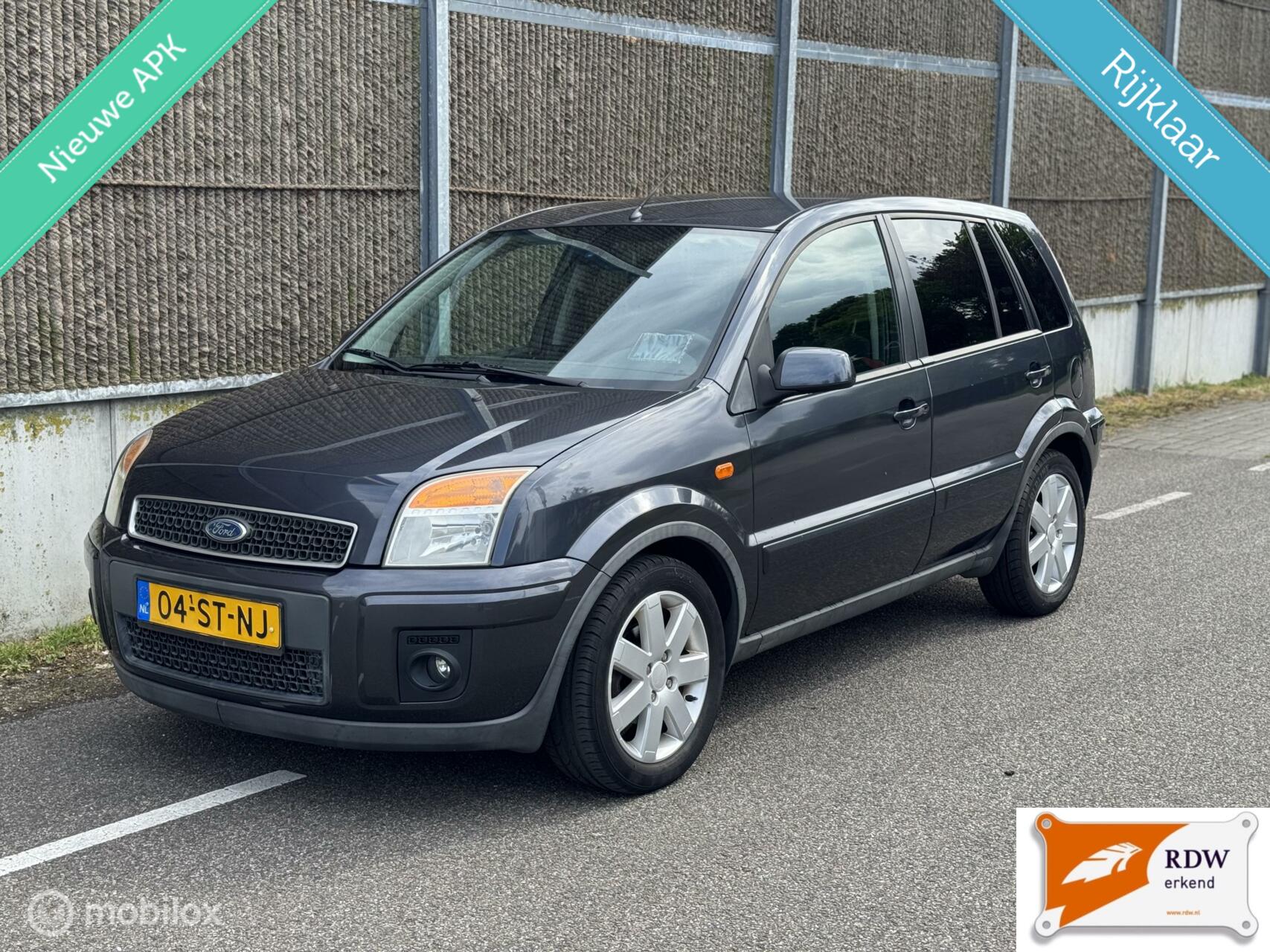 Ford Fusion + 1.4-16V Champion NAP/NWE APK/AIRCO/NETTE AUTO 2006 - voorkant