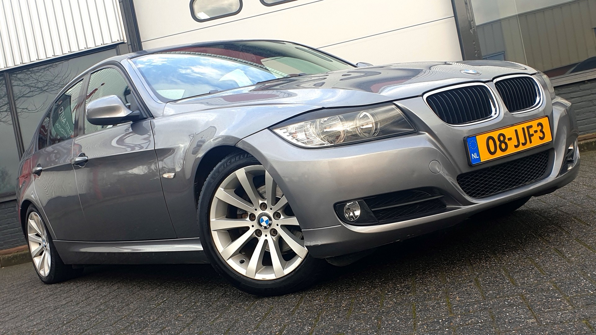 BMW 3-serie 318i Business Line *2009*Dashcam*PDC*NAVI*NAP!! 2009 - voorkant