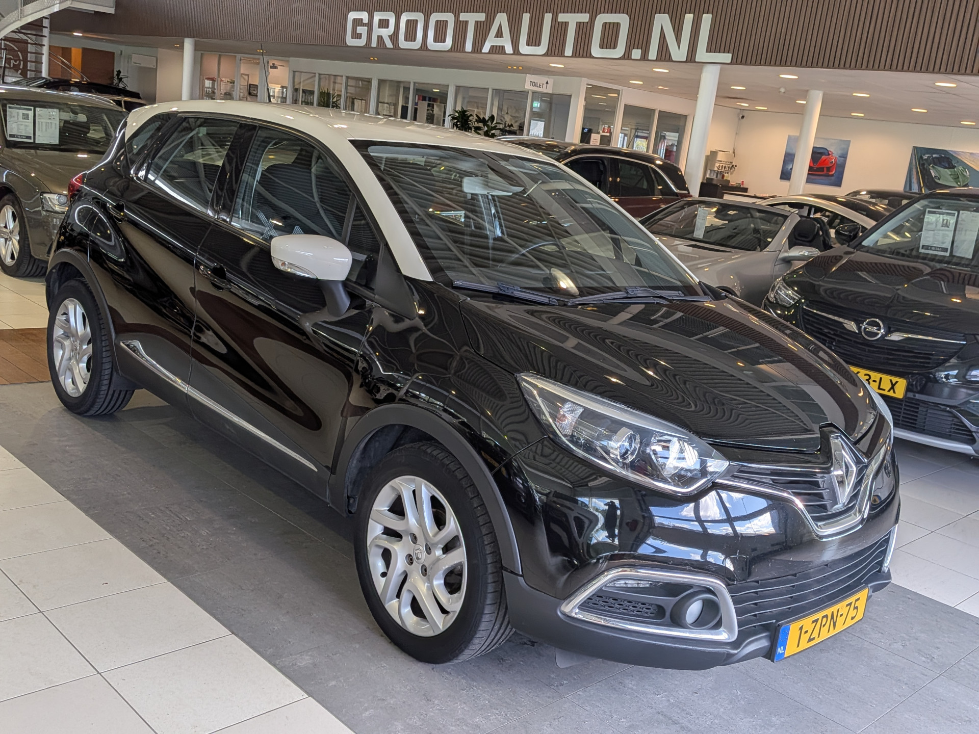 Renault Captur 0.9 TCe Dynamique 2014 - voorkant