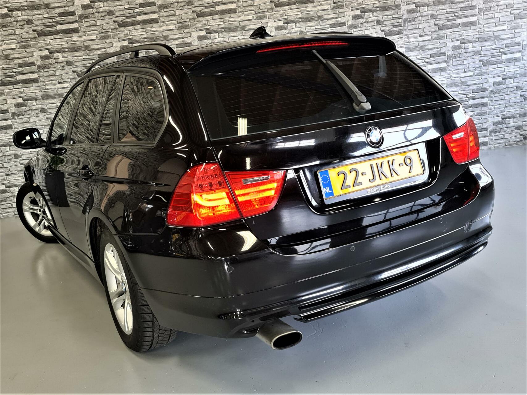BMW 3-serie Touring 320i Business Line 2009 - voorkant