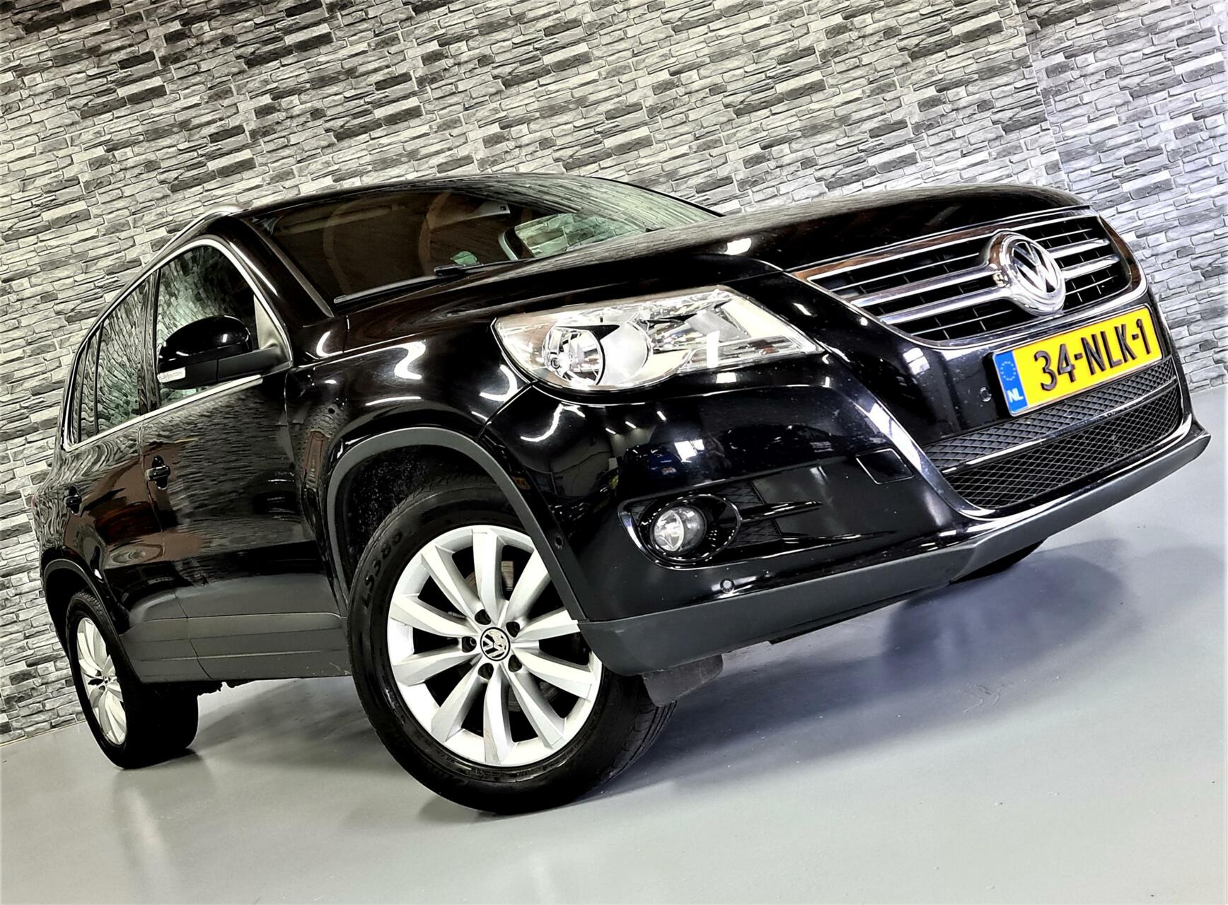 Volkswagen Tiguan 1.4 TSI Sport&Style *NAVI*PDC*Nwe ketting! 2010 - voorkant