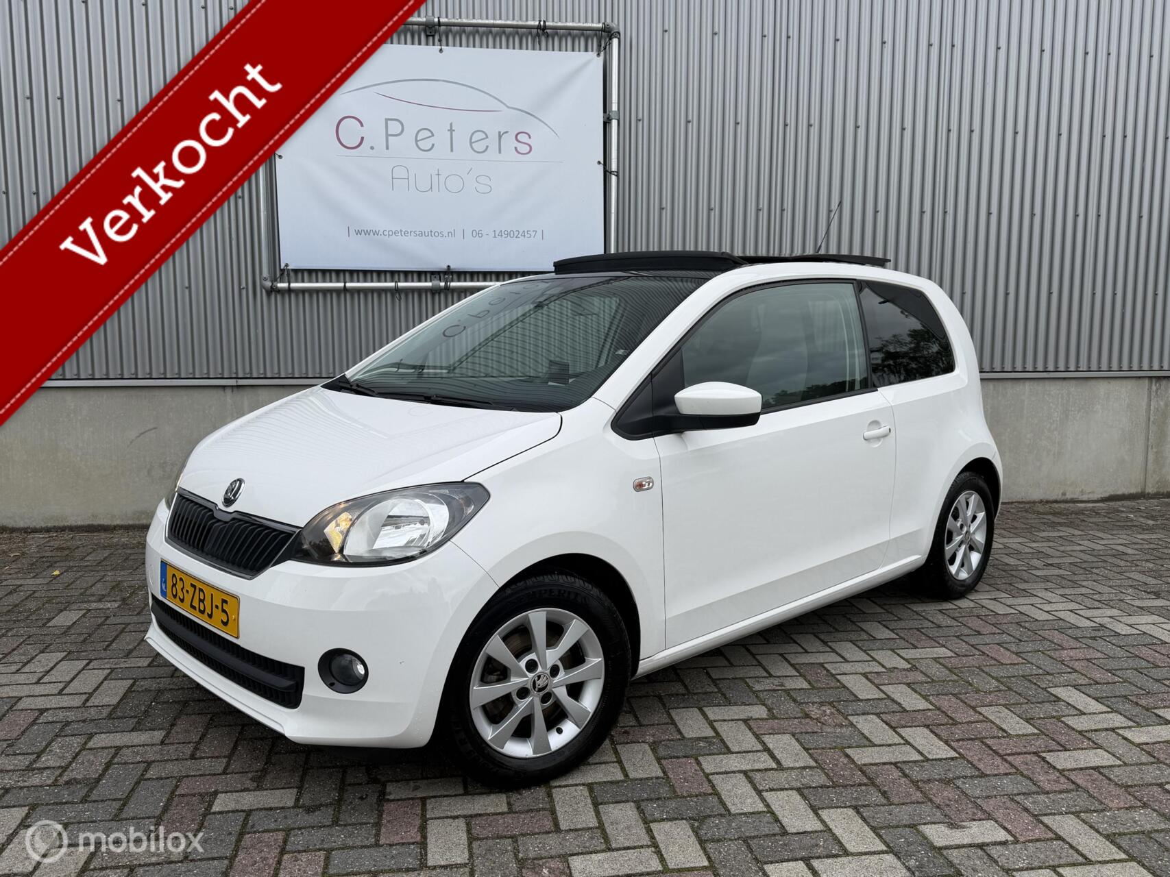 Skoda Citigo 1.0 75pk Greentech Elegance 2012 / Schuifdak / Cruisecontrol / Navigatie / Airco / 1e eigenaar NAP 2012 - voorkant