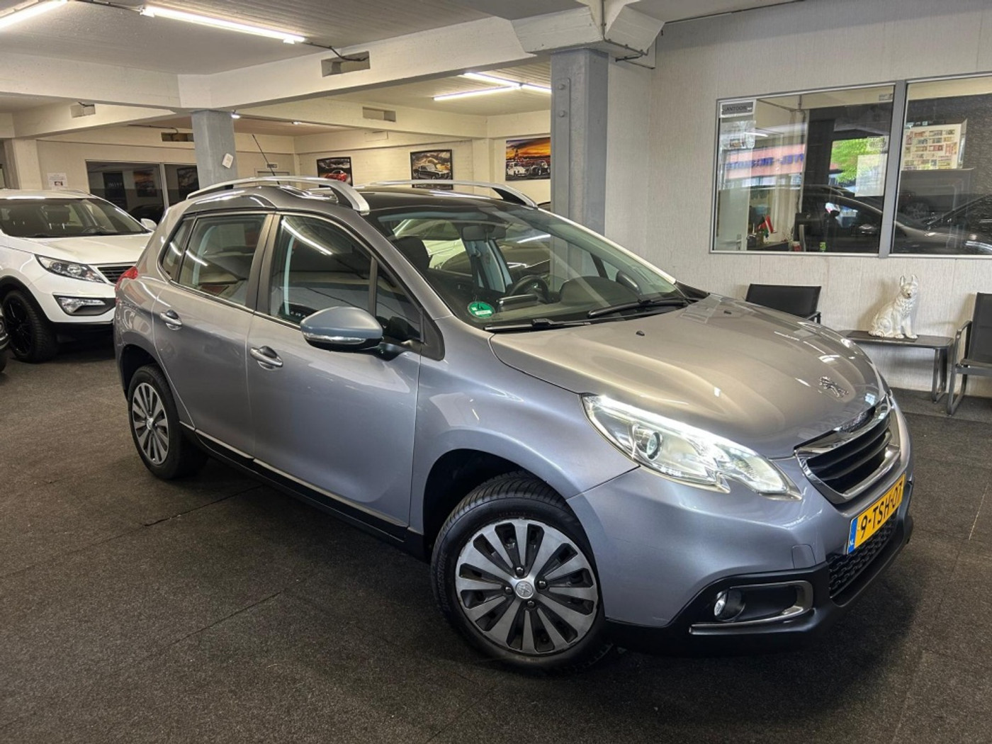 Peugeot 2008 1.2 VTi Act. Pack Pr*Automaat*Pano*Navi 2014 - voorkant