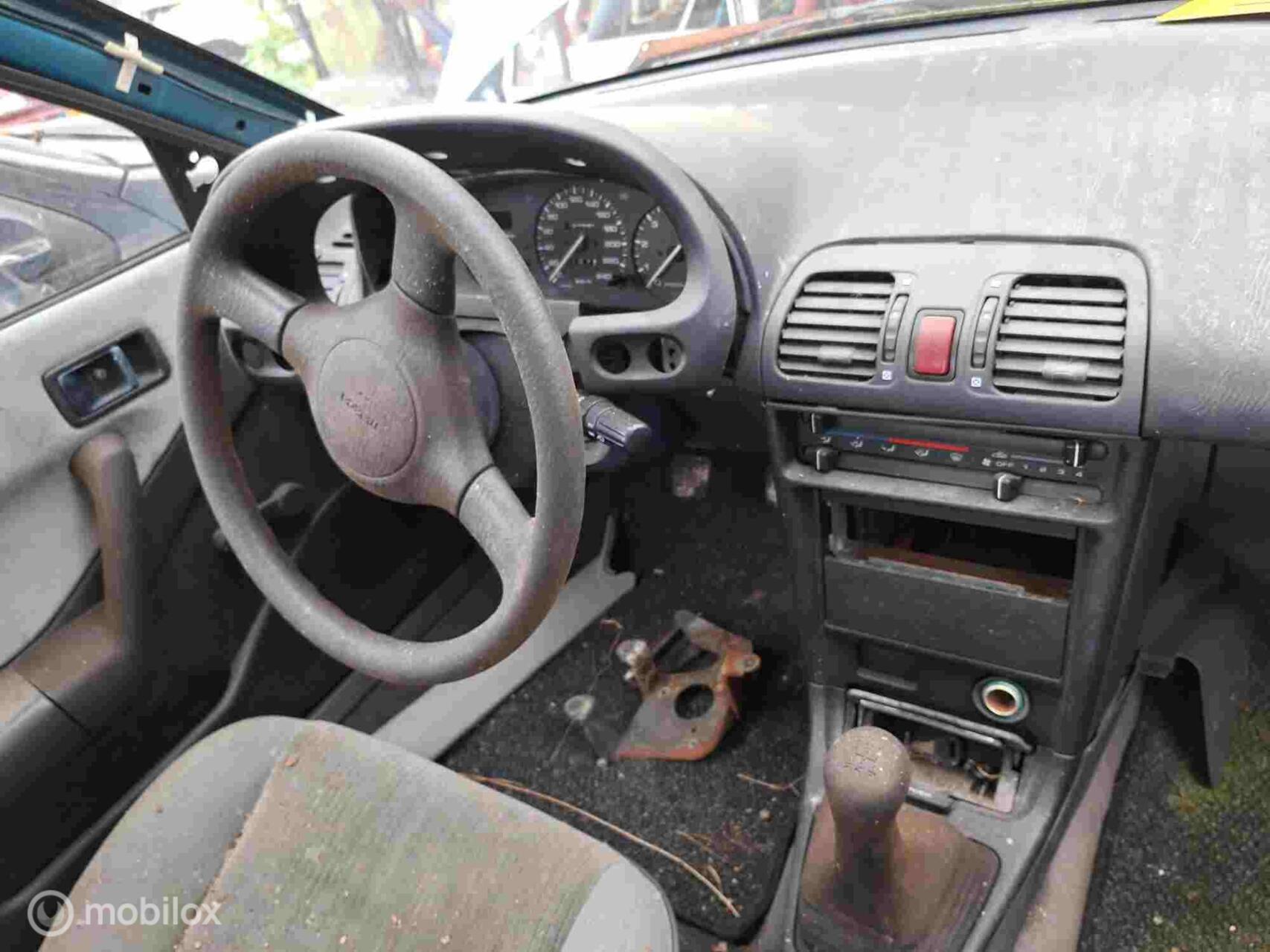 Foto van Mazda 323