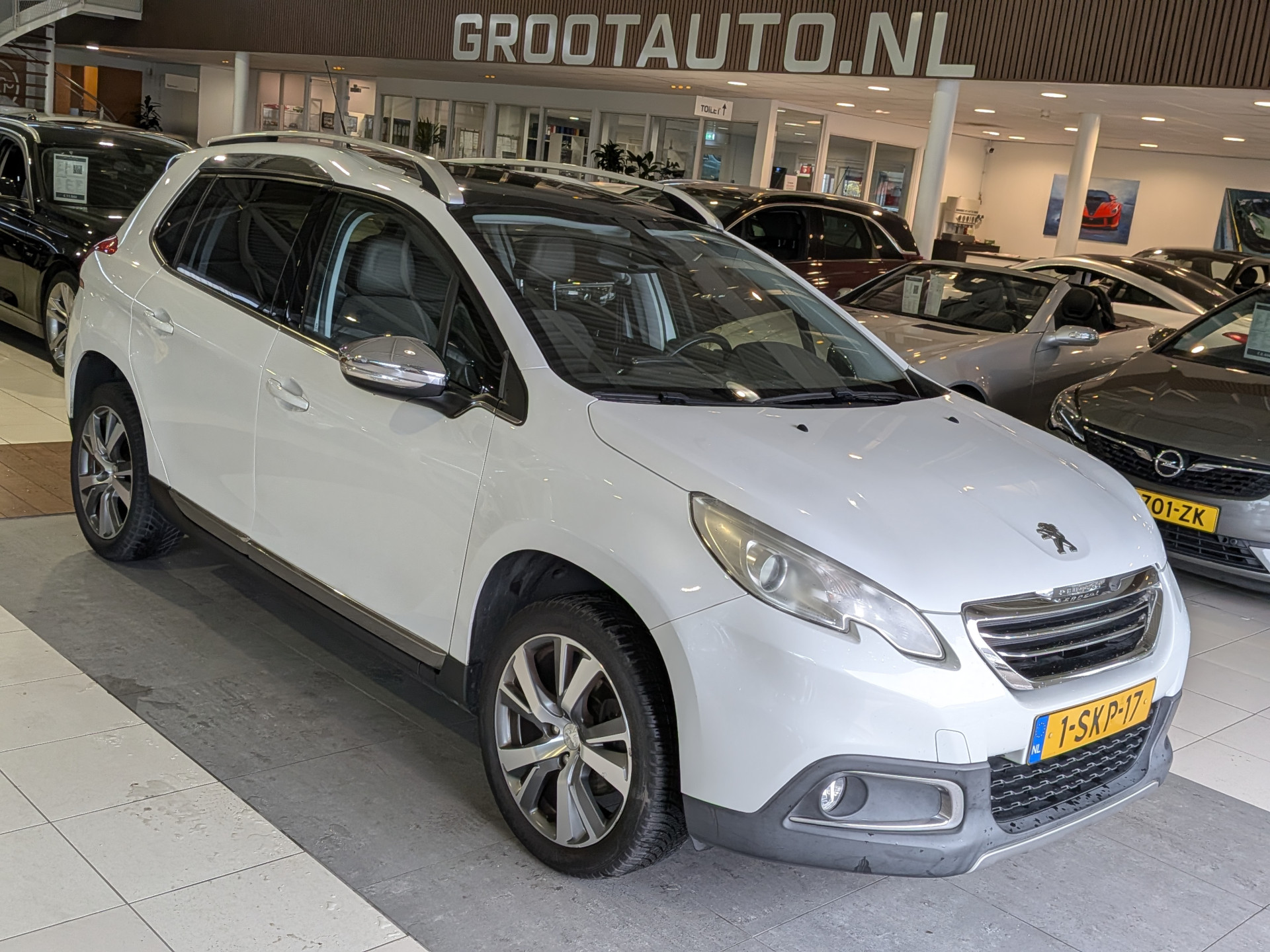 Peugeot 2008 1.6 VTi Féline 2013 - voorkant