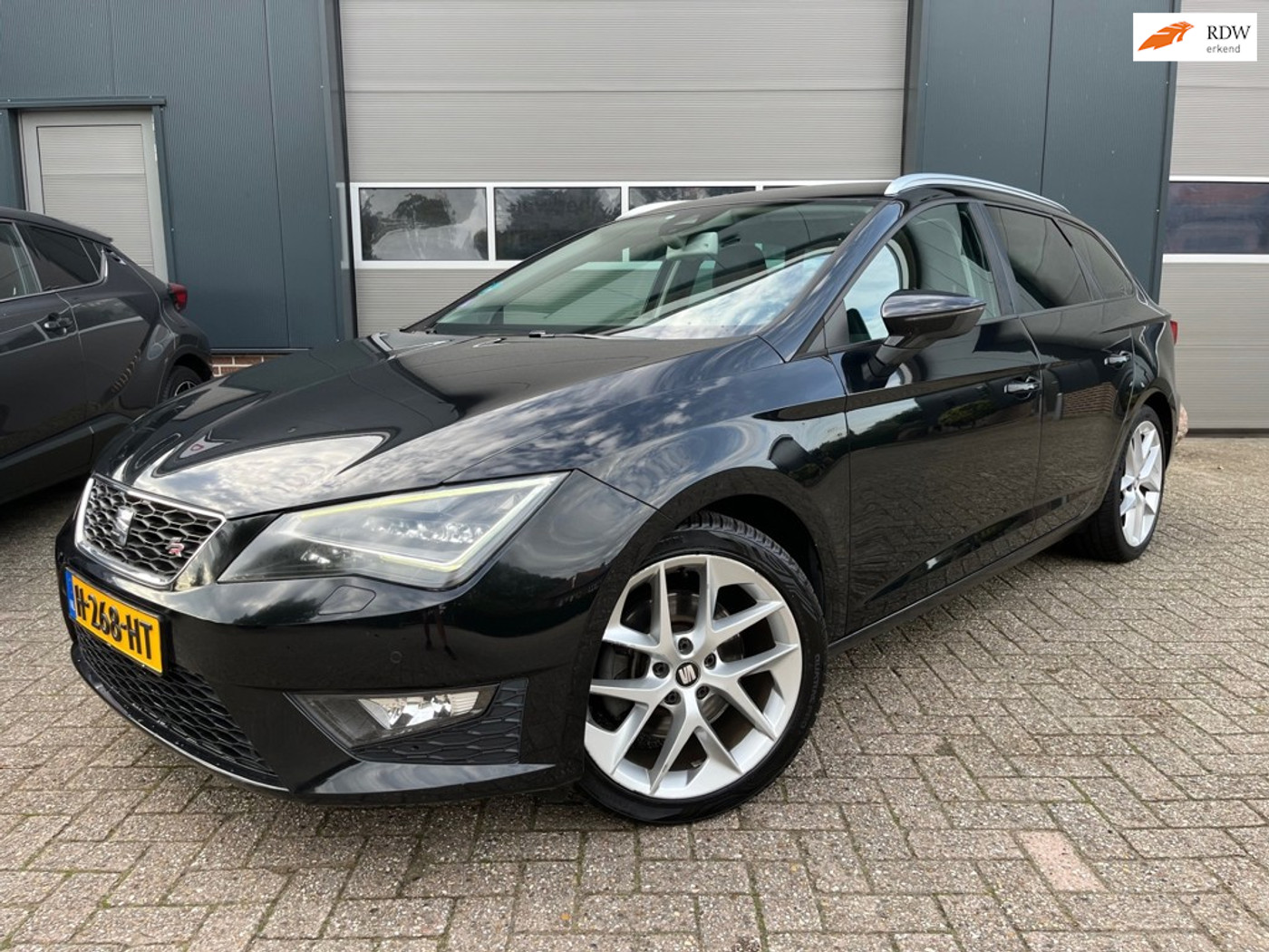 Seat Leon ST 1.8 TSI FR Business-Automaat-Seat Sound-LED-Stoelverwaring-PDC! 2014 - voorkant