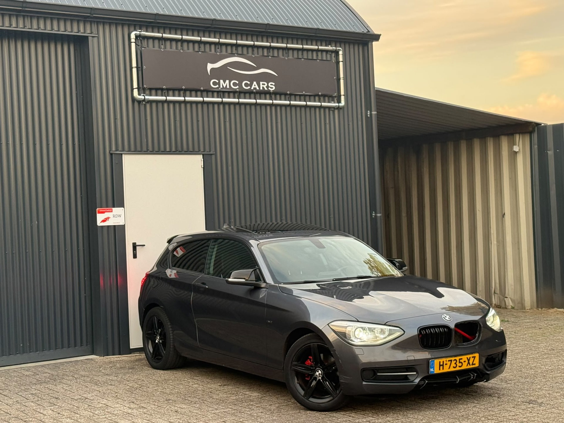 BMW 116d 116d Business+ AUTOMAAT!!DAK!!LEER!!XENON!! 2013 - voorkant