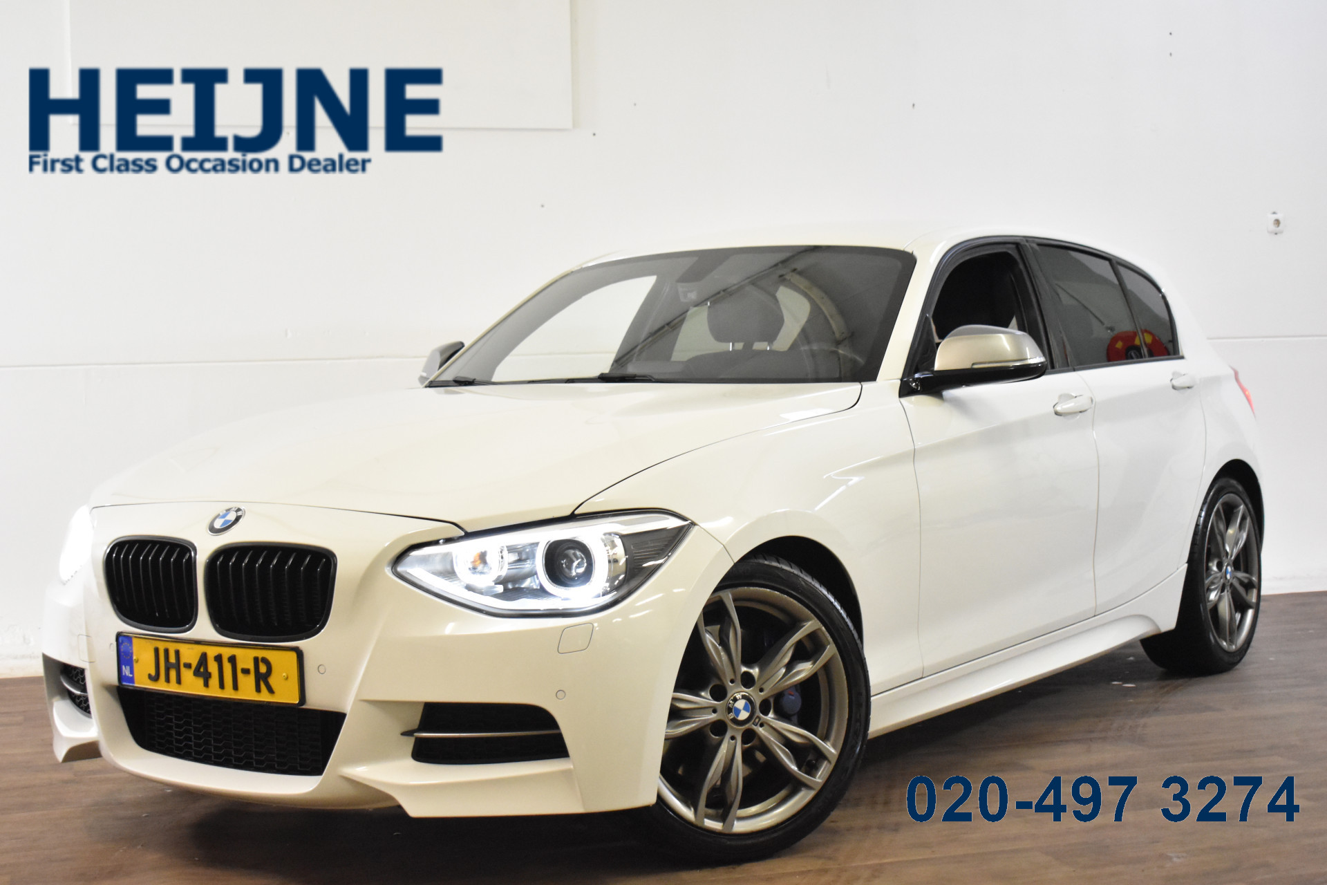 BMW M135i xDrive M135IA 320PK AUT. X-DRIVE M-SPORT 2013 - voorkant