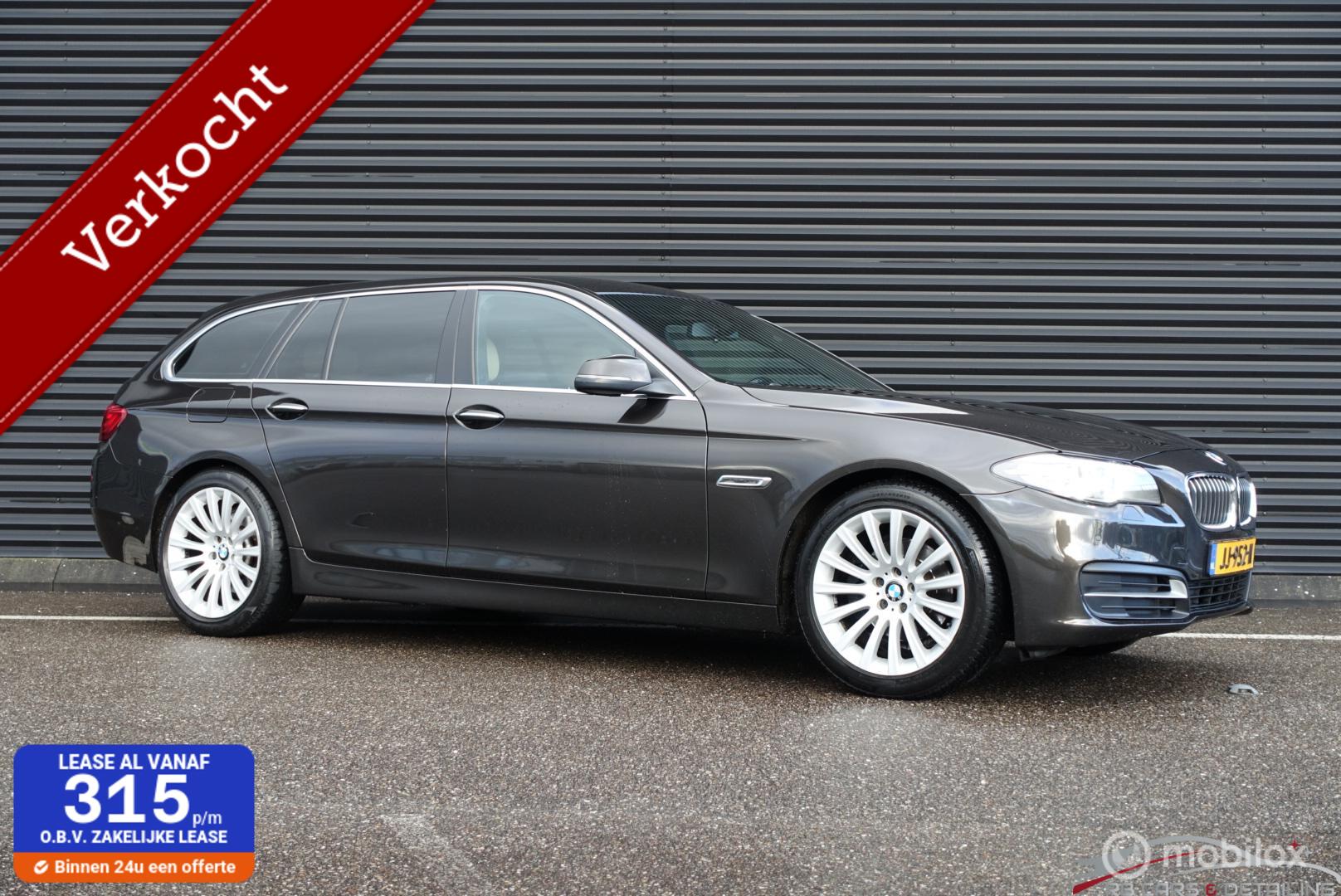 BMW 5-serie Touring 520i Executive, Leder, Trekhaak 2016 - voorkant