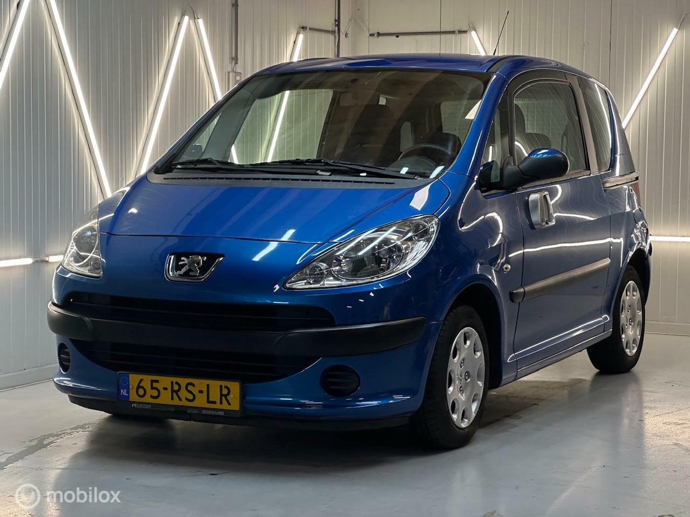 Peugeot 1007 1.4 Gentry | NAP | SCHUIFDEUREN | BIEDEN 2005 - voorkant