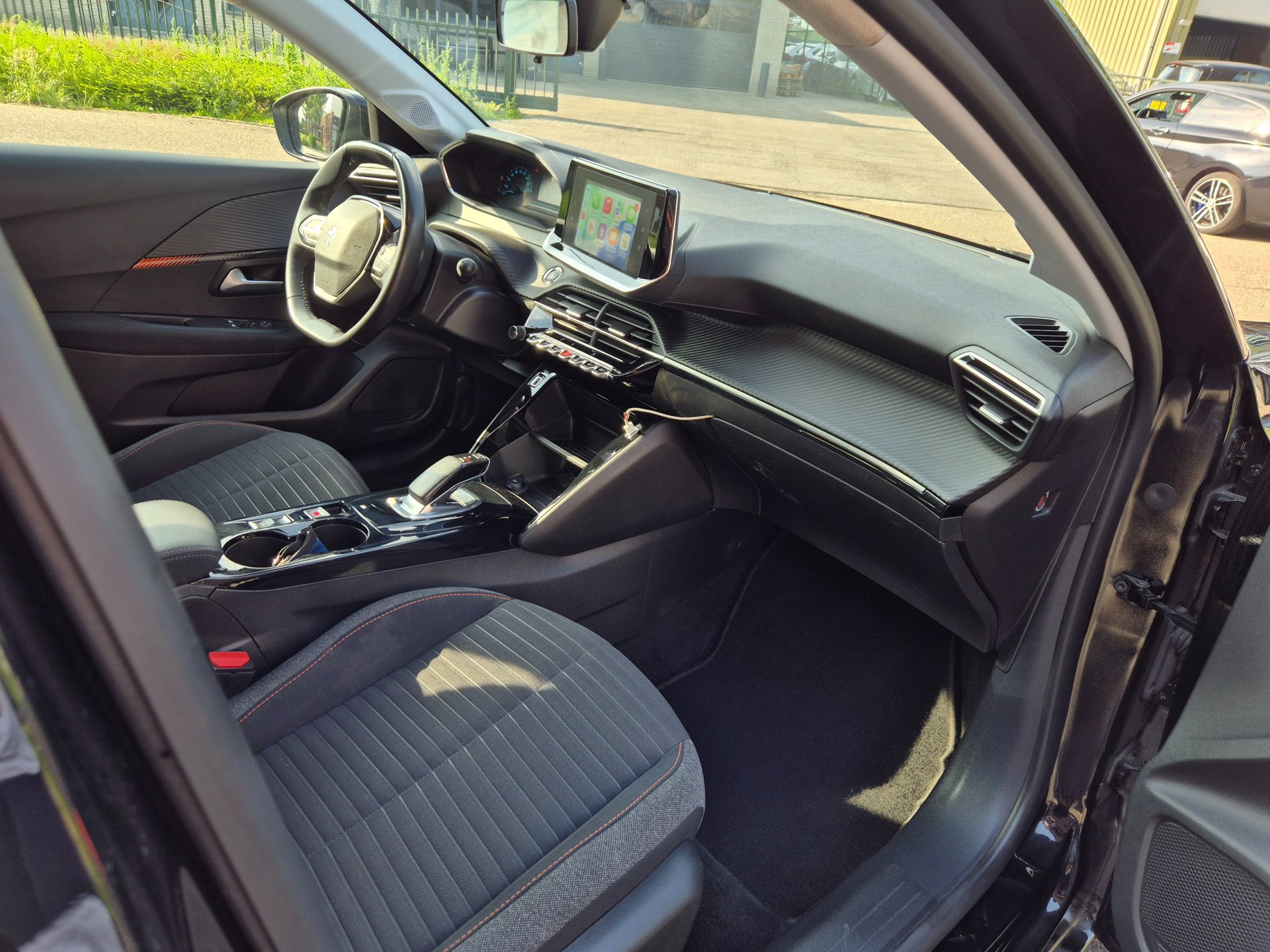 Foto van Peugeot E-208