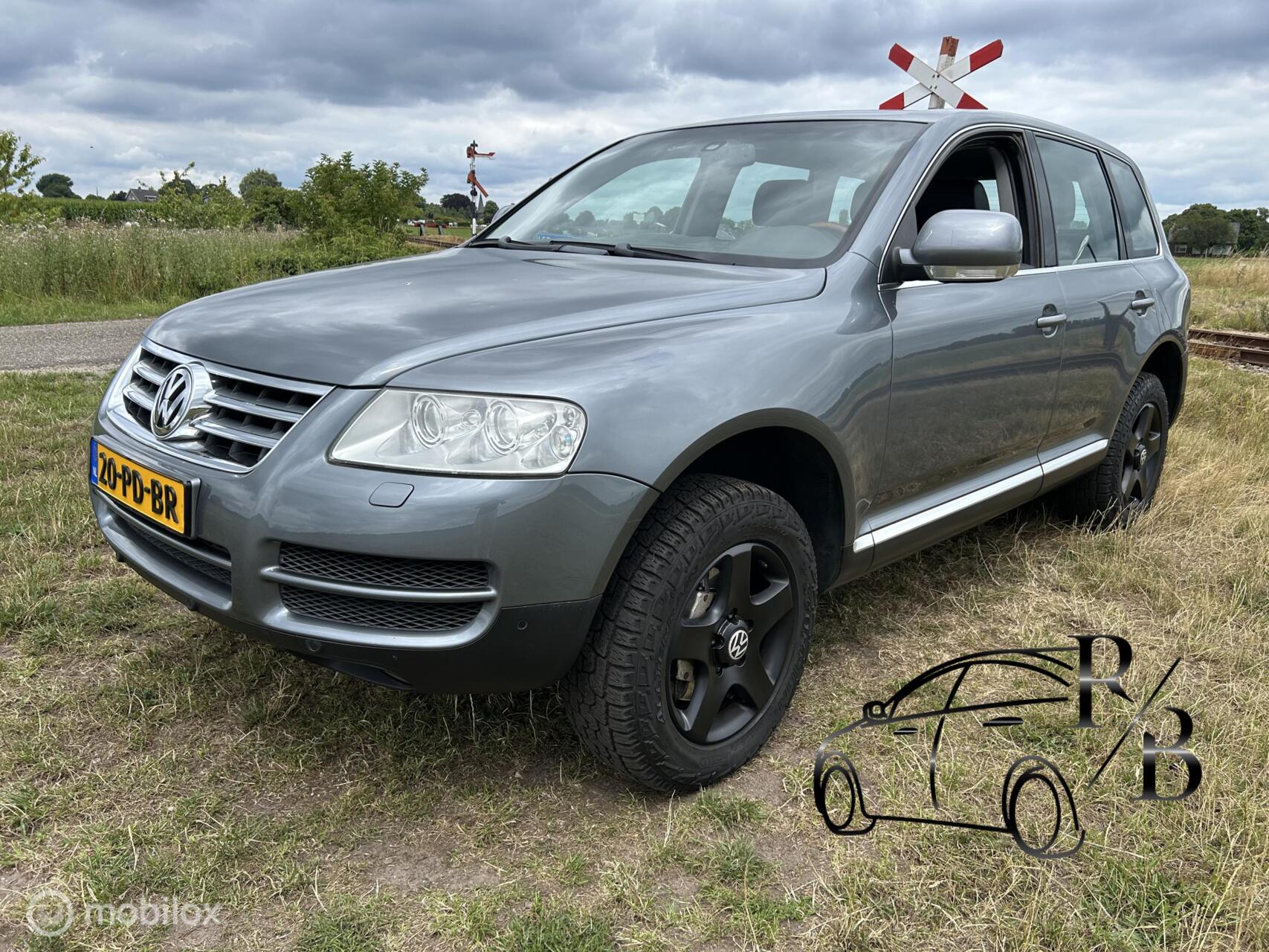 Volkswagen Touareg 3.2 V6 AUT. LEER NAVI PARK SENS. LEES TEKST 2004 - voorkant
