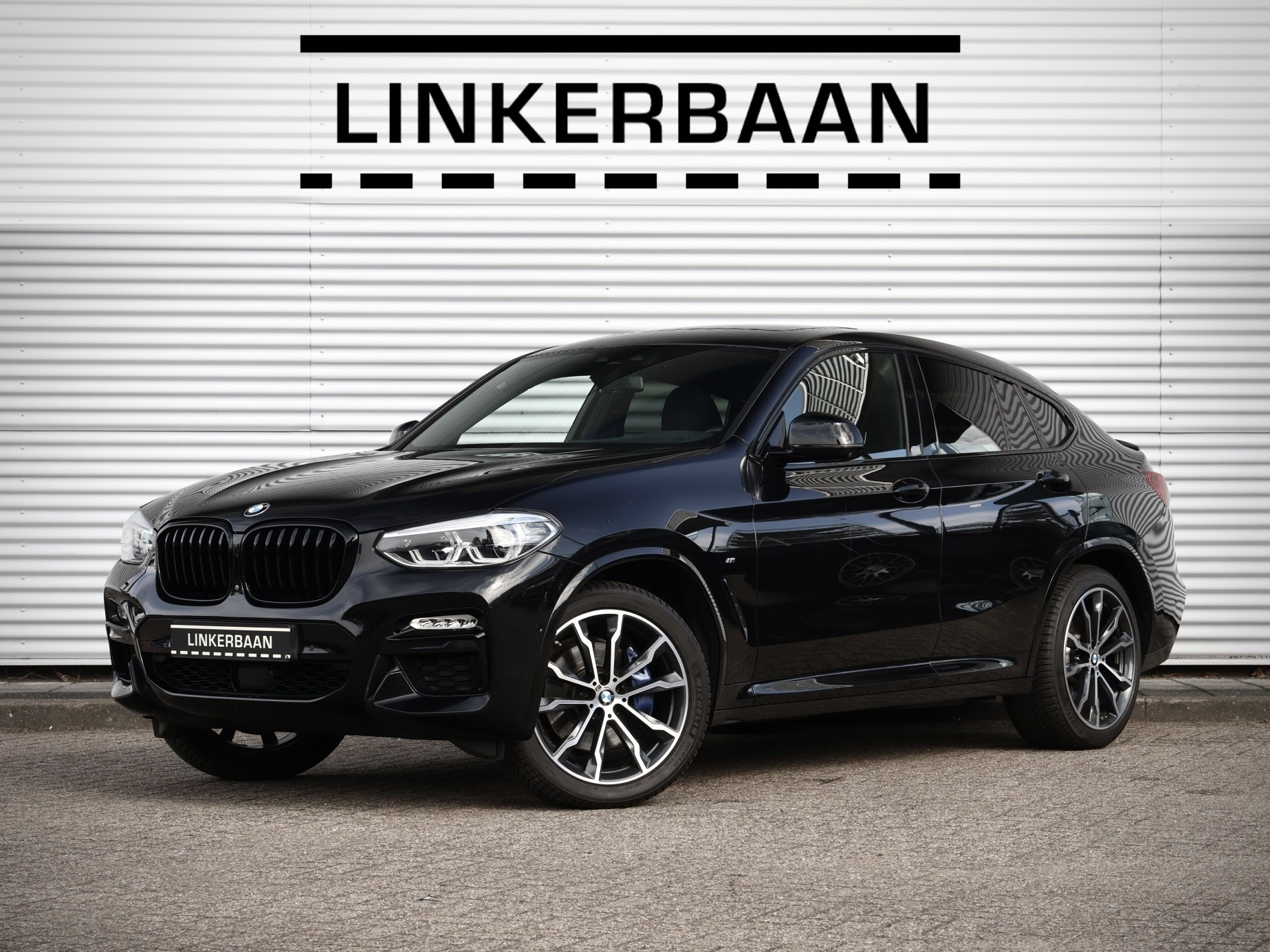 BMW X4 M40i High Executive | Panodak | H&K | Trekhaak | Driving Assistant Plus | 20 inch | 2019 - voorkant