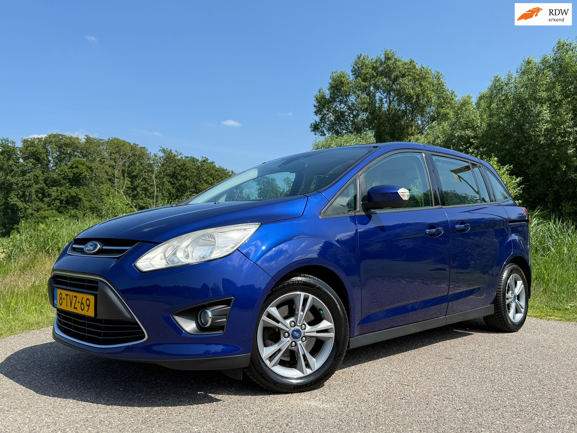 Ford Grand C-max 1.0 Trend / Navi / Airco / 16" Velgen / PDC / Cruise / 6 Versnellingen /Rijklaar! / 2014 - voorkant