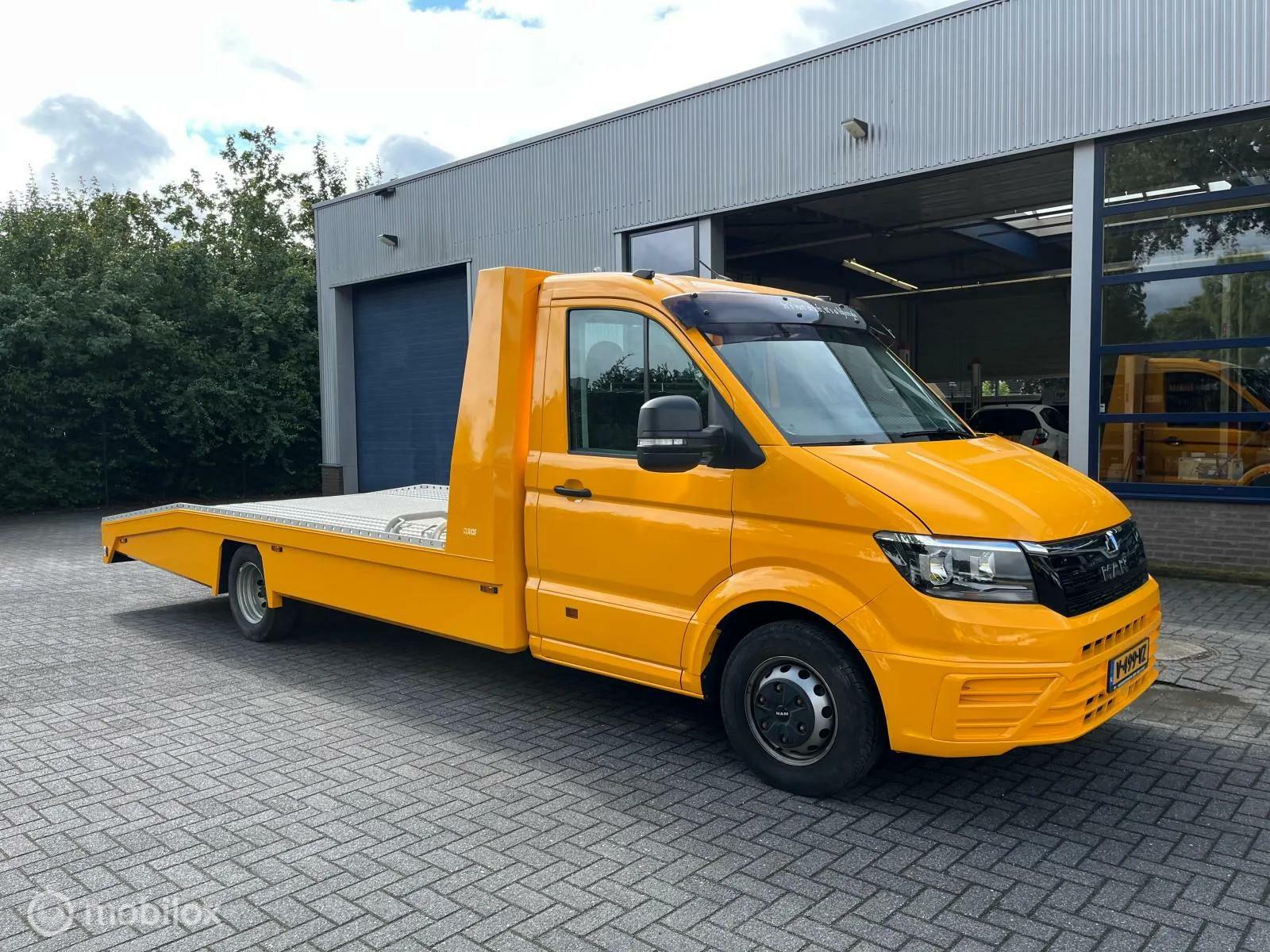 Foto van Man Tge