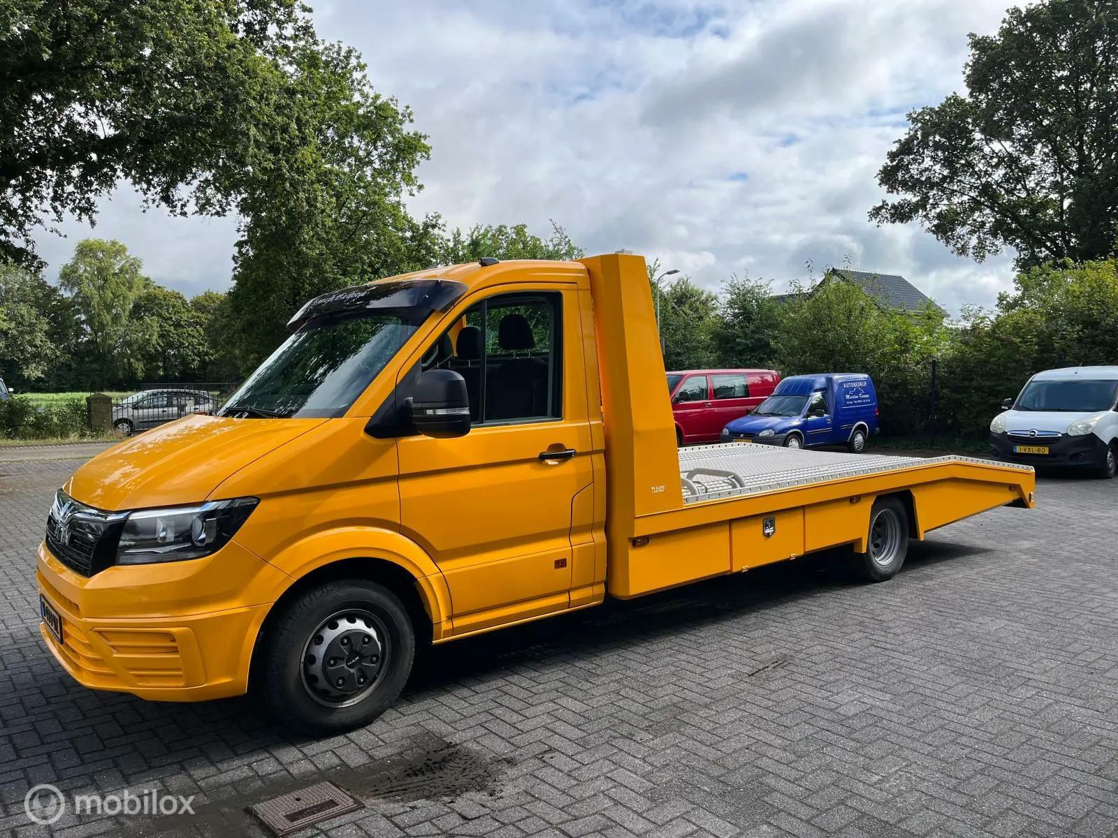 Foto van Man Tge