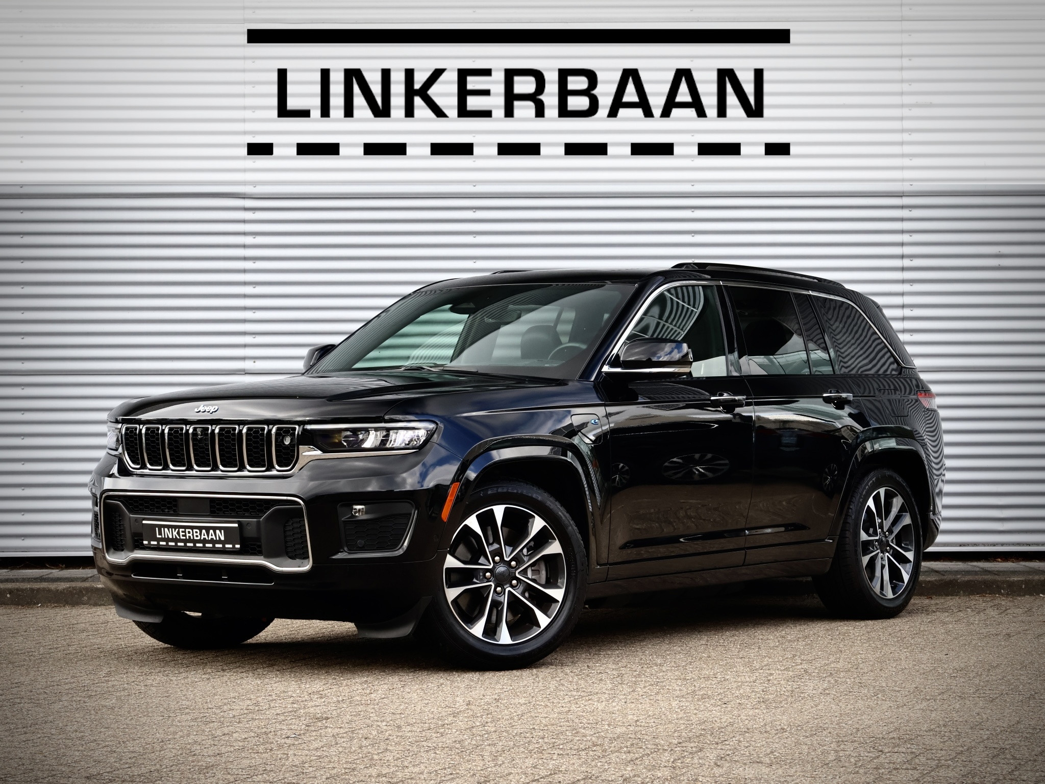 Jeep Grand Cherokee 2.0 Hybride | SOH 96% | Overland | Full Option | Panodak | Luchtvering | Trekhaak | Mcintosh | 21 inch | 2023 - voorkant