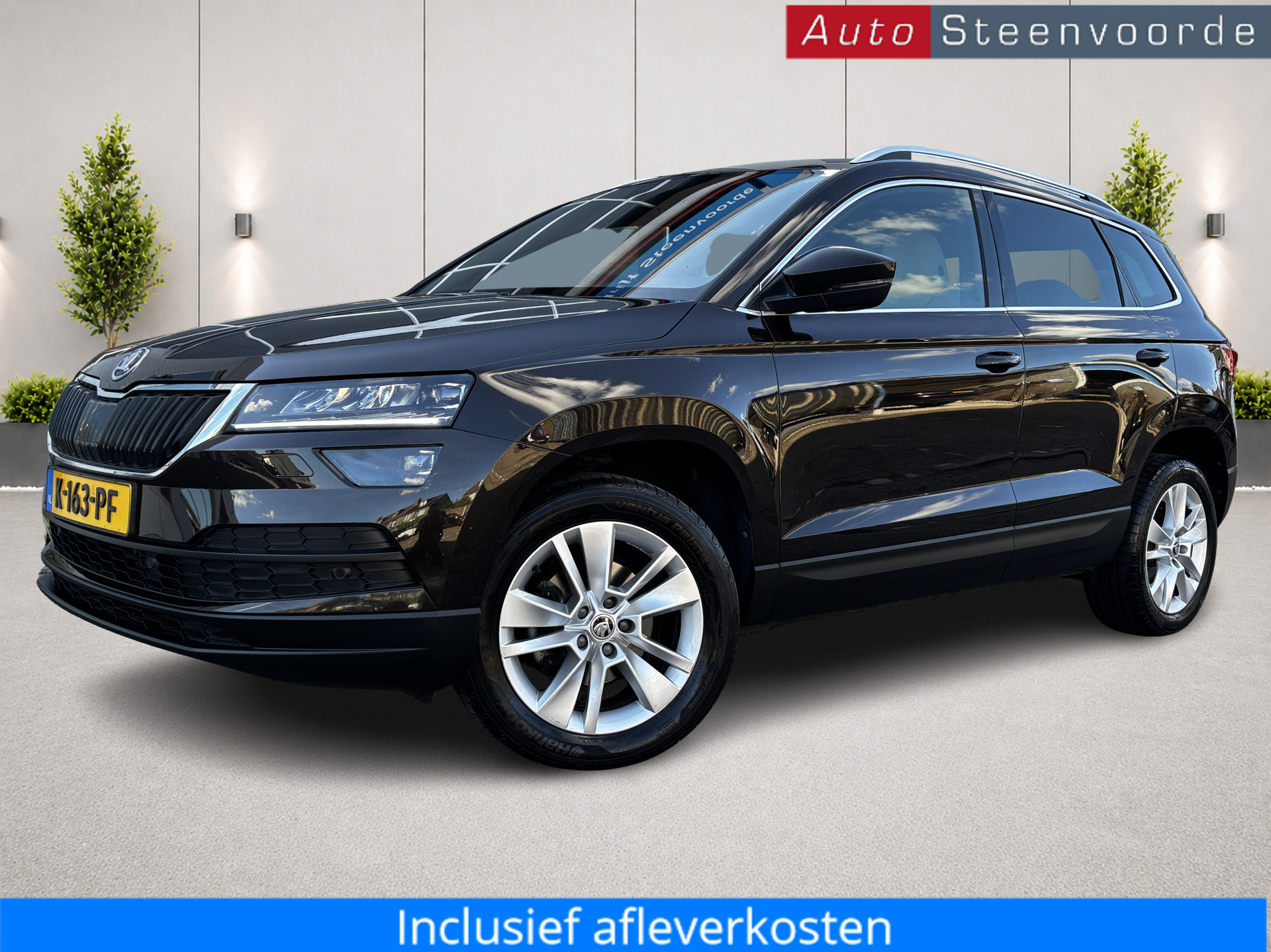 Skoda Karoq 1.5 TSI ACT Business Edition Plus  * CREME LEER * CAMERA 2021 - voorkant