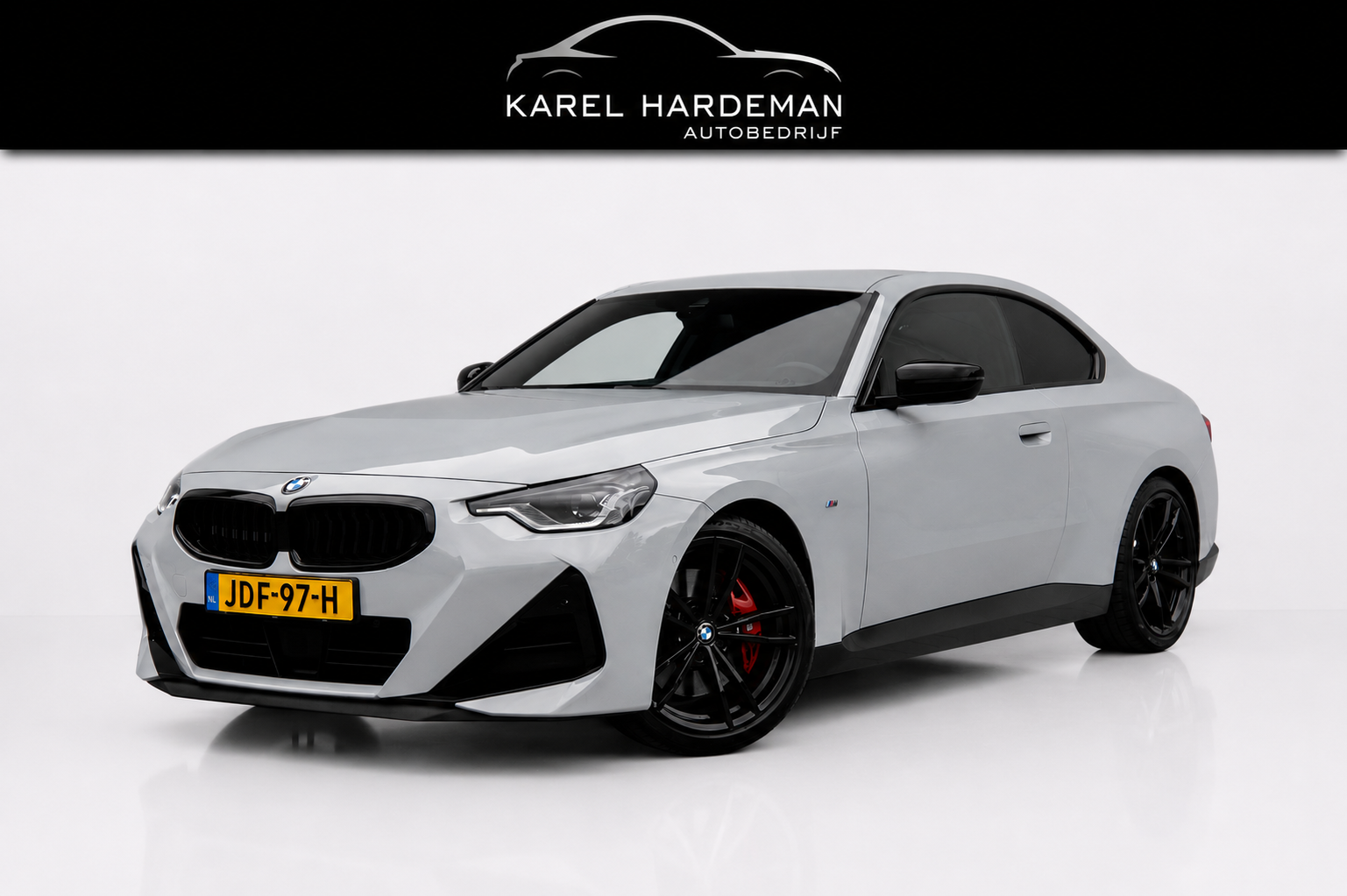 BMW 2-serie Coupé 218i | HUD | H&K |M-Pakket 2023 - voorkant