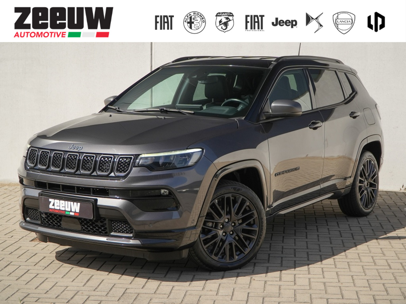 Jeep Compass 4xe 240 PK Hybrid 80th Anniversary | Leder | Navi | Cam | 19" 2022 - voorkant