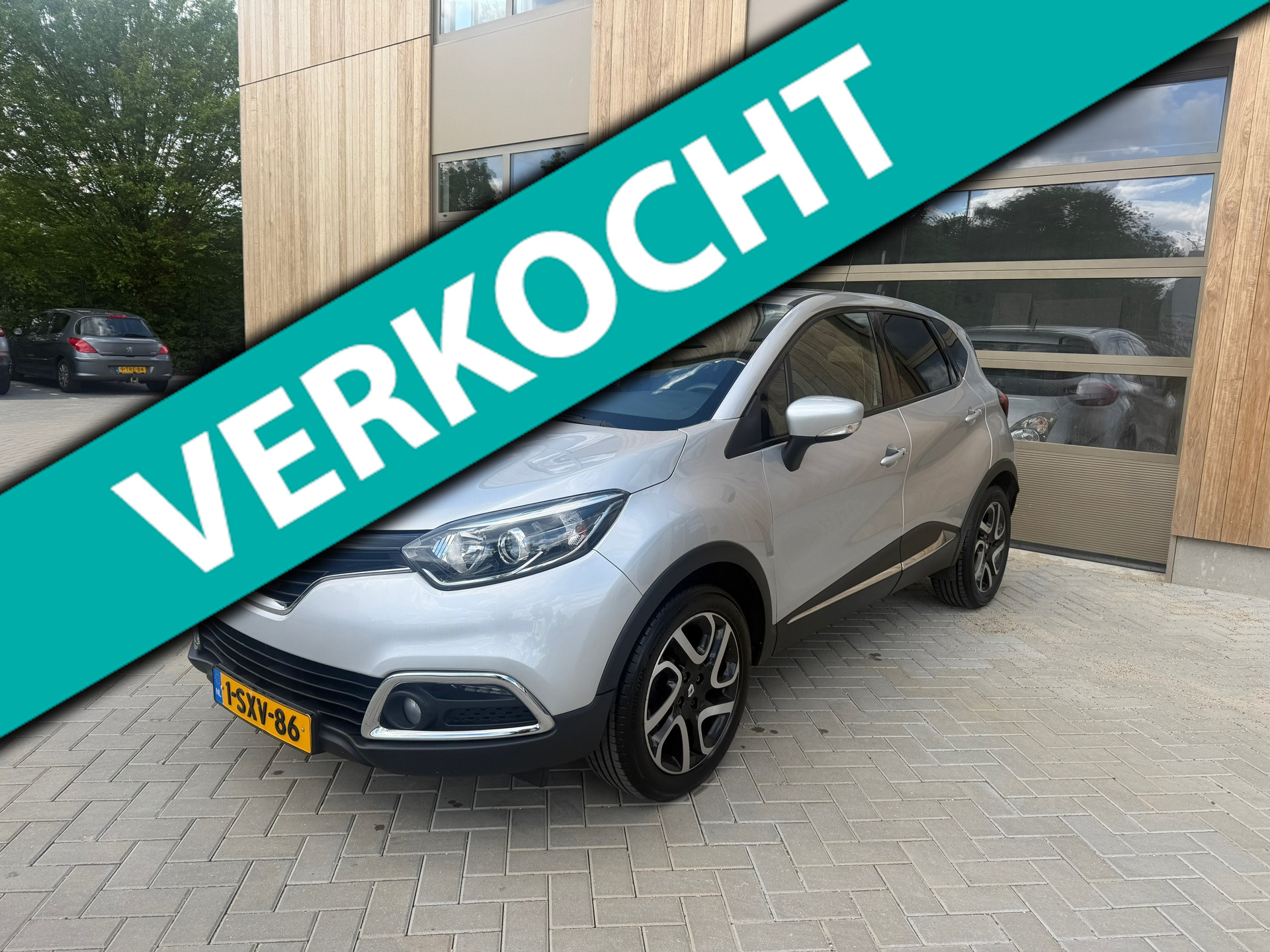 Renault Captur 0.9 TCe Dynamique 5DRS|Clima|Keyless|NAVI|Parkeersensoren|Achteruirijcamera|Nieuwe APK 2014 - voorkant