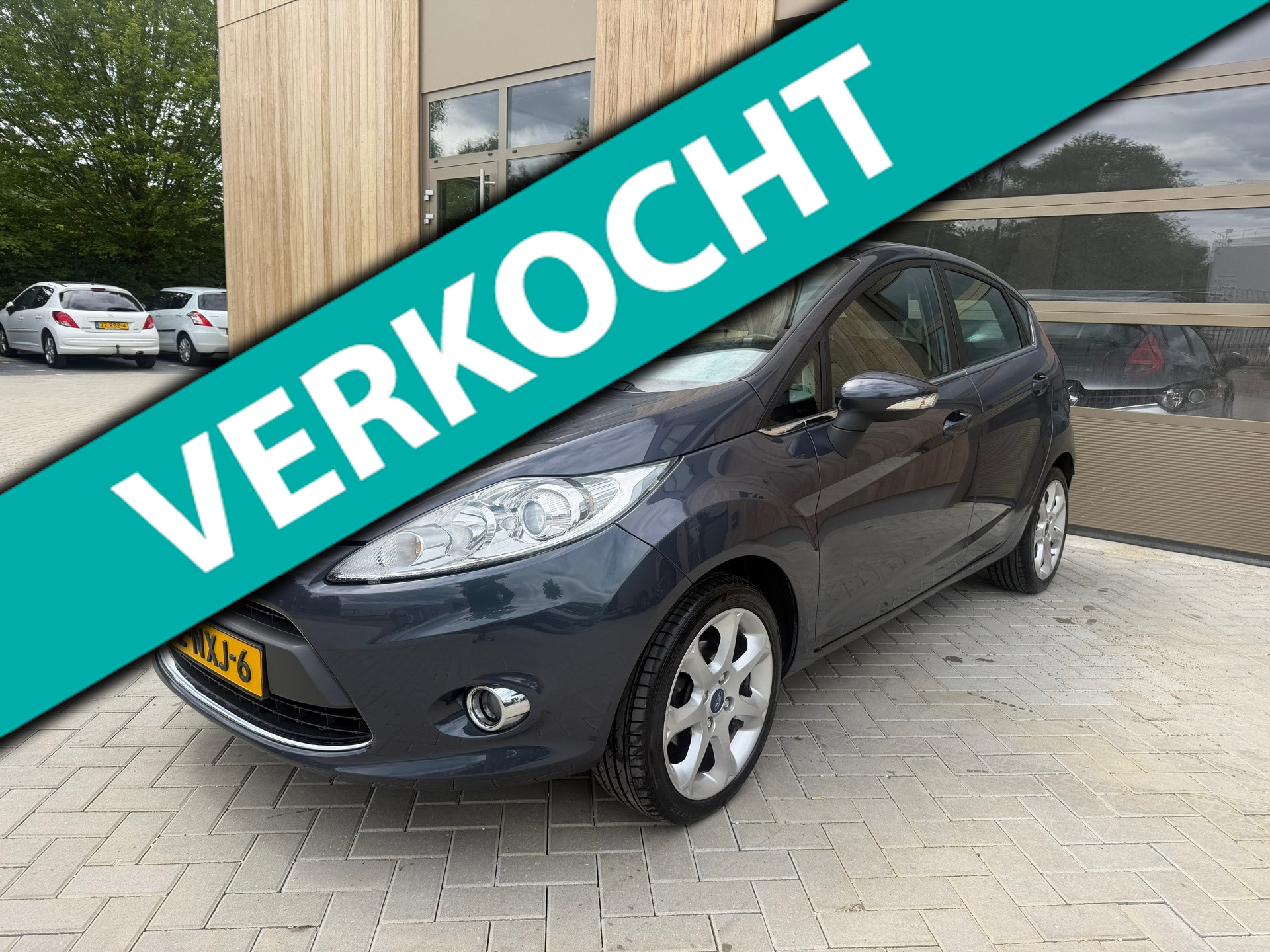 Ford Fiesta 1.25 Titanium 5DRS|Parkeersensoren |Cruise Controle|keyless|Clima|Nieuwe APK 2010 - voorkant