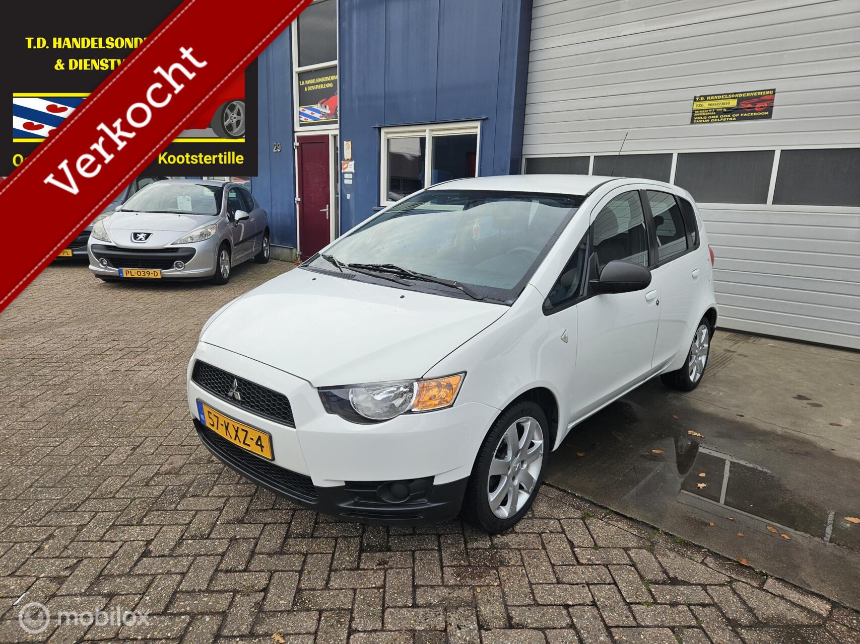 Mitsubishi Colt 1.1 Edition One 2010 - voorkant