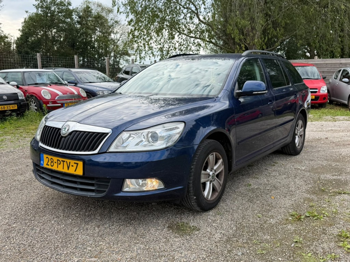 Skoda Octavia Combi 1.2TSI 105pk Ambition Business ECC/cruise/navi/PDC/trekhaak 2011 - voorkant