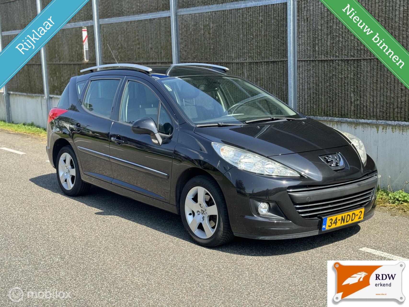 Peugeot 207 SW 1.6 VTi Blue Lease Executive NAP/PANO/AIRCO/NWE KOPPELING 2010 - voorkant