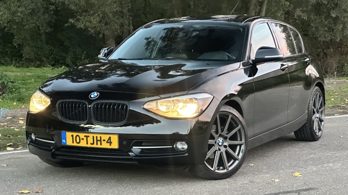 BMW 1-serie 116i Business+ | AIRCO | Lichtmetaal | Nieuwe DB | 2012 - voorkant