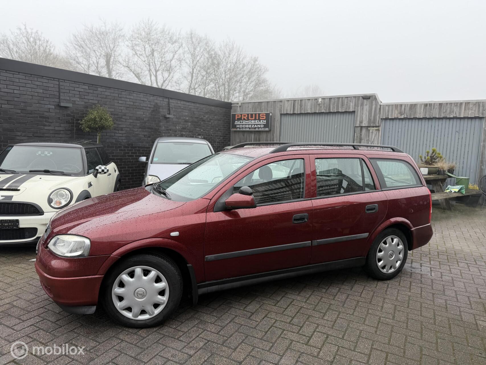 Foto van Opel Astra-g-caravan