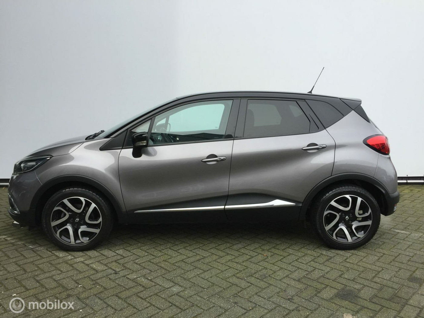 Renault Captur - 1.2 TCe Dynamique * automaat - navi - camera - trekhaak 2013 - voorkant